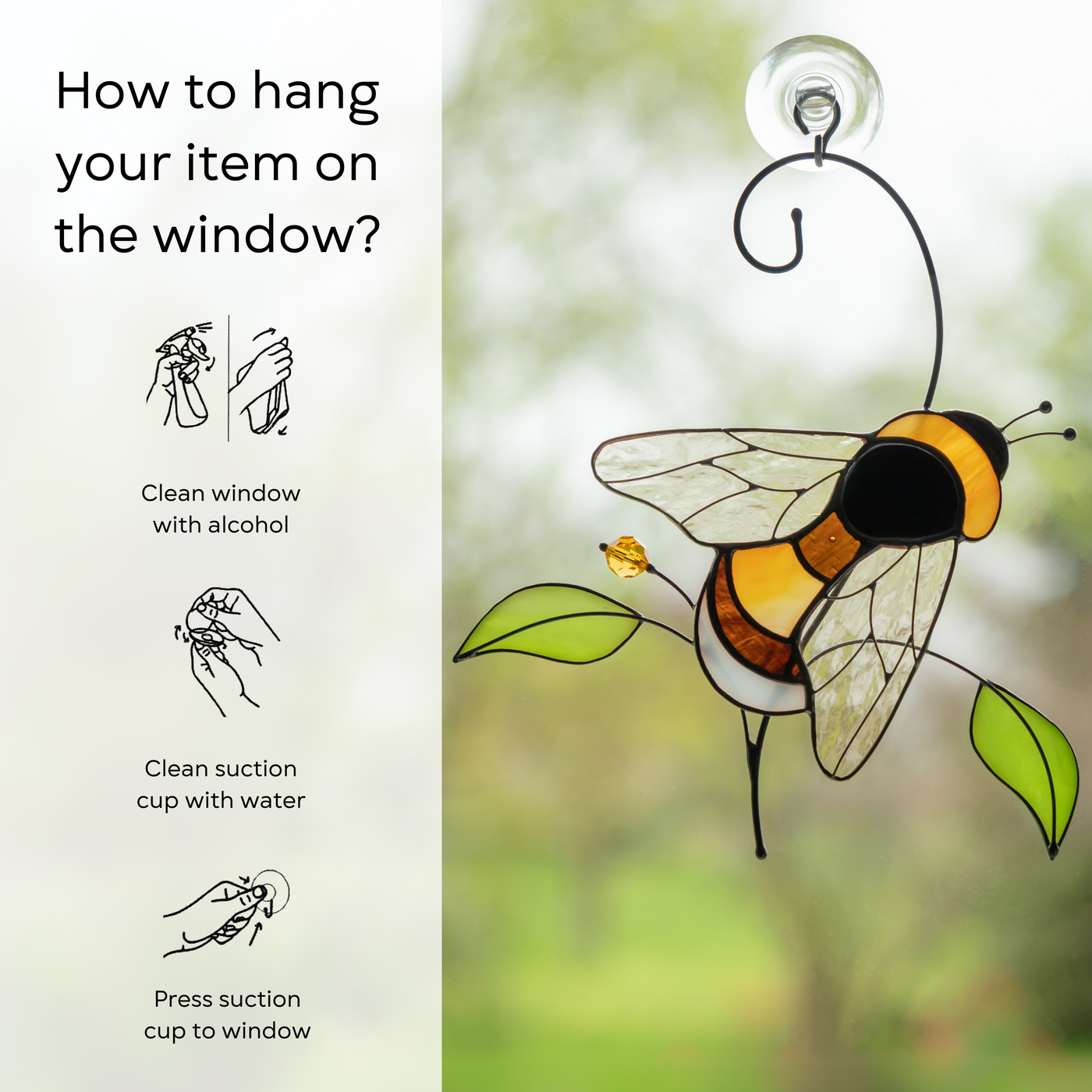 Bumble bee stained glass hanging on a window with green leaves and a yellow bead with instruction beside: clean window and suction cup, press a cup to the surface.