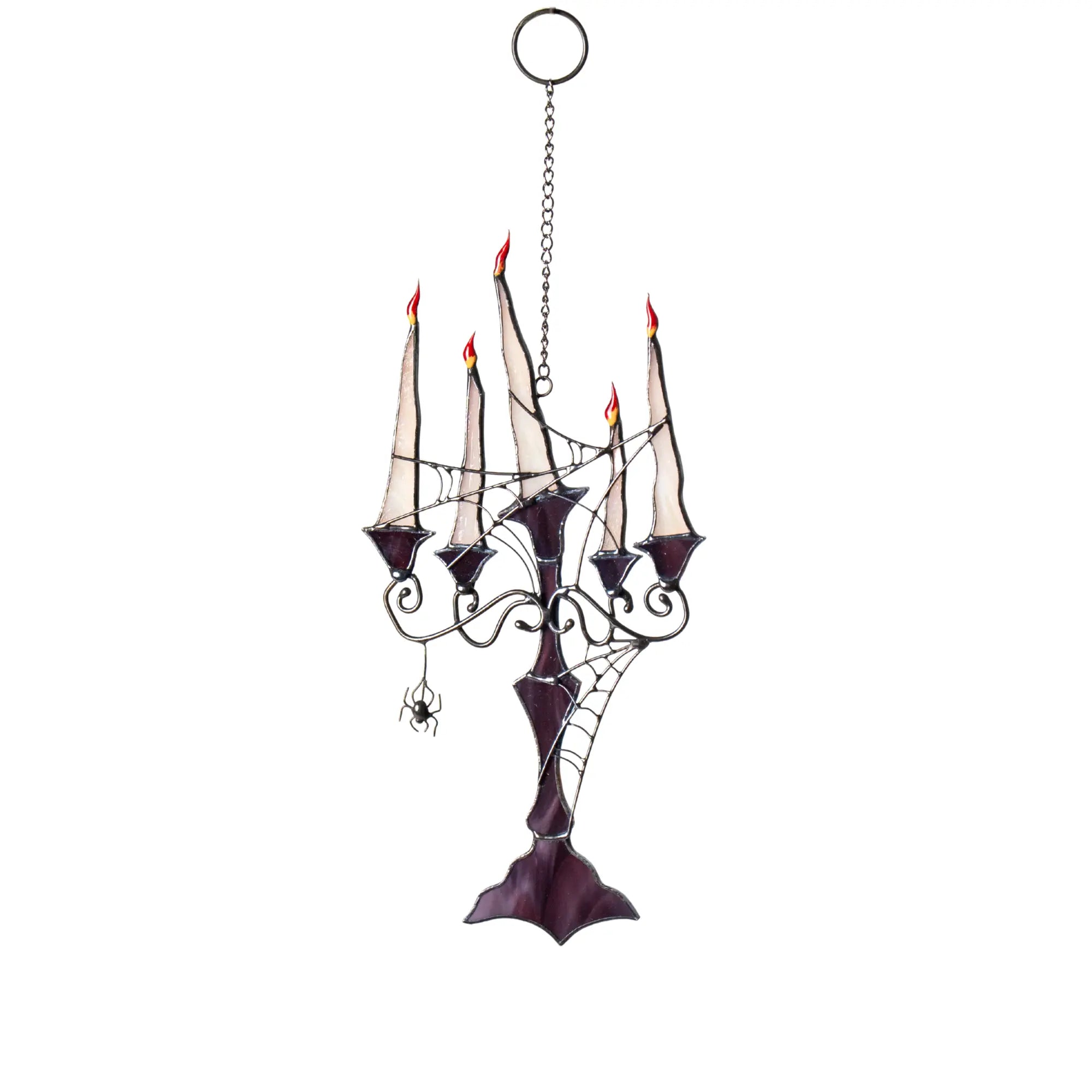 Halloween-themed stained glass candelabra suncatcher with candles on a white background