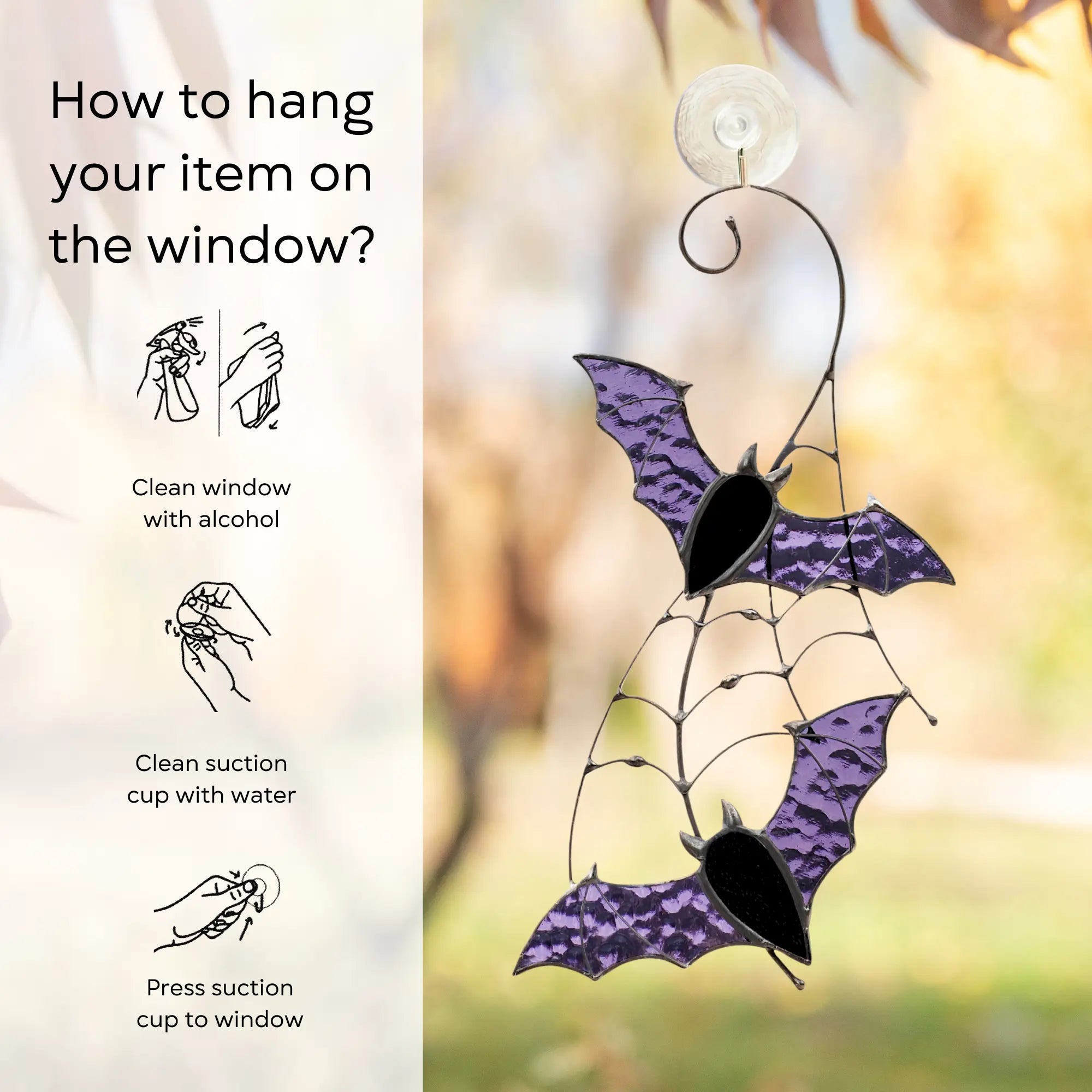 Purple bat-shaped window decoration with instructions on how to hang it on a window: clean window and suction cup, press a cup to the surface
