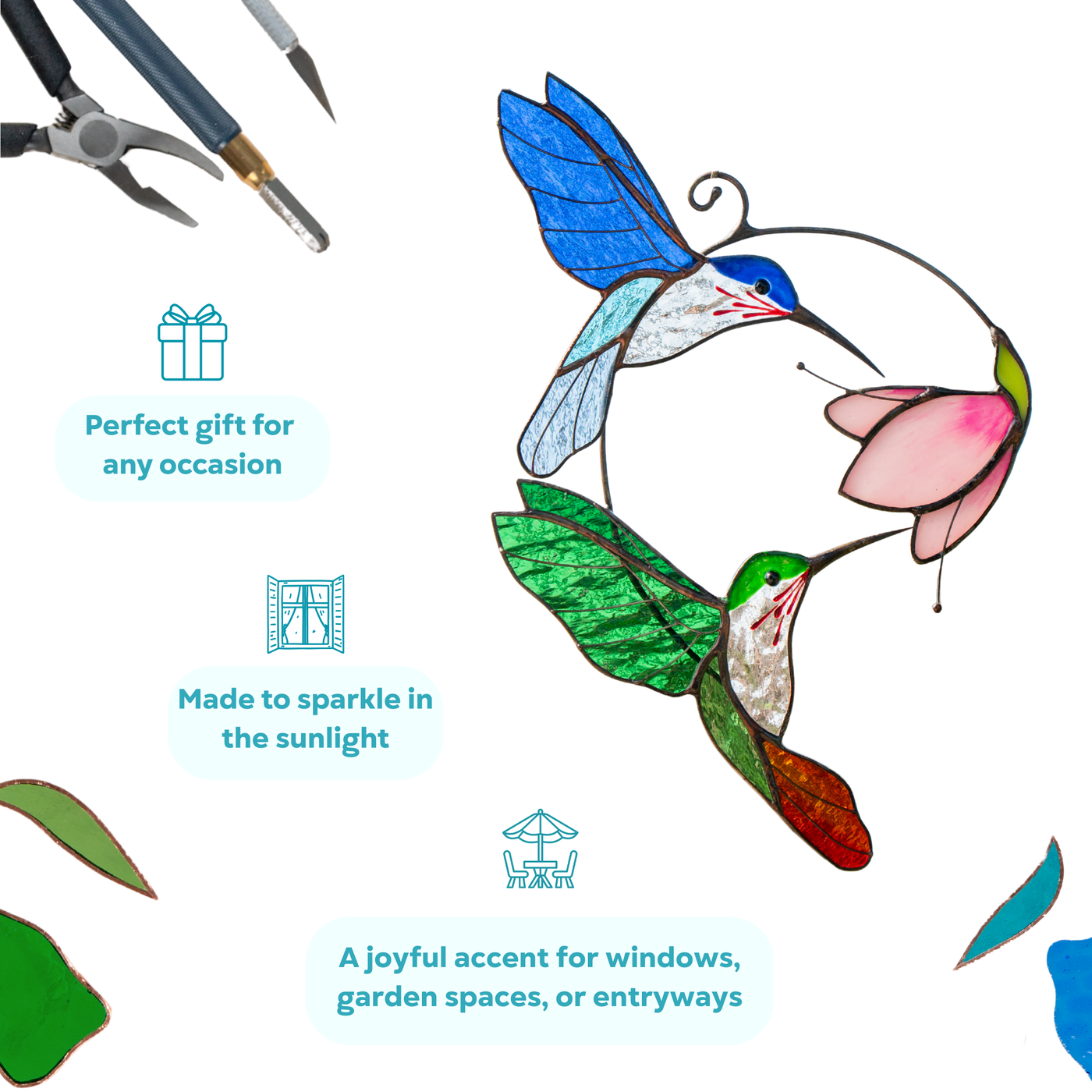 Colorful stained glass suncatcher - the perfect gift for any person, with birds and flower surrounded by crafting tools.