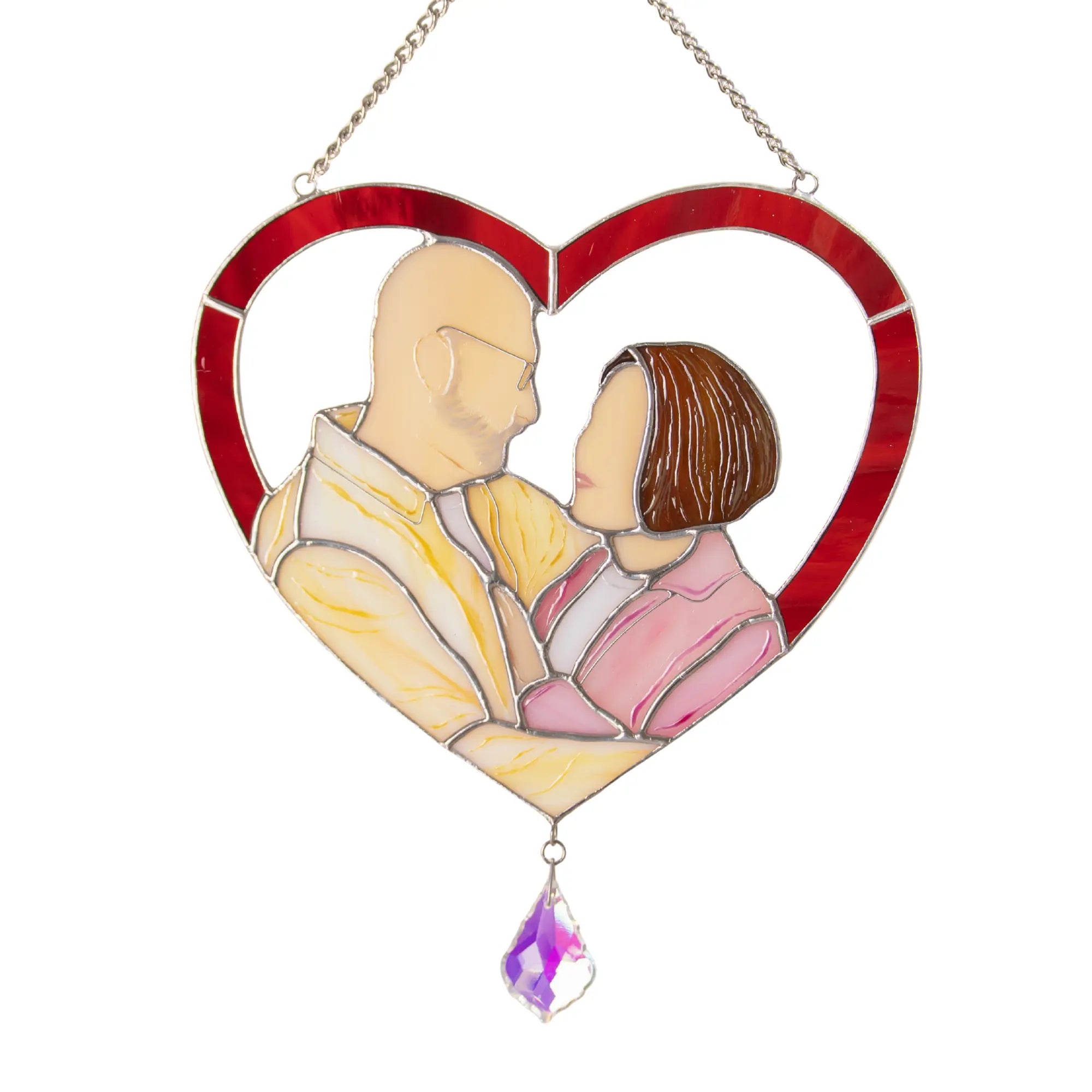 Heart-shaped custom stained glass suncatcher with a couple and a crystal pendant on a white background