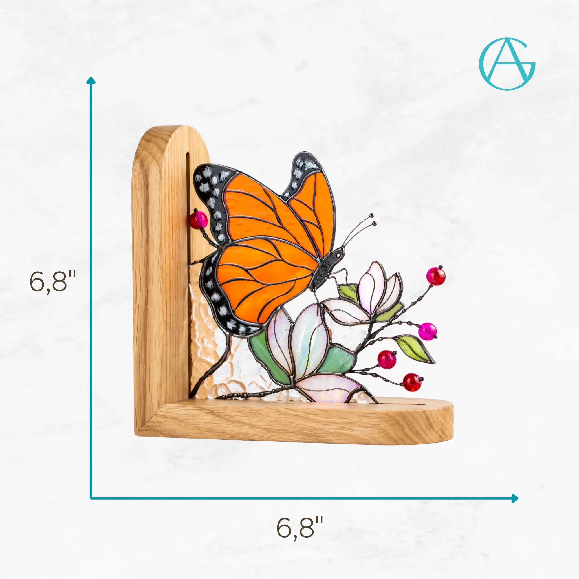 Stained glass butterfly bookend with orange wings, pastel flowers, red glass beads, and natural wooden frame
