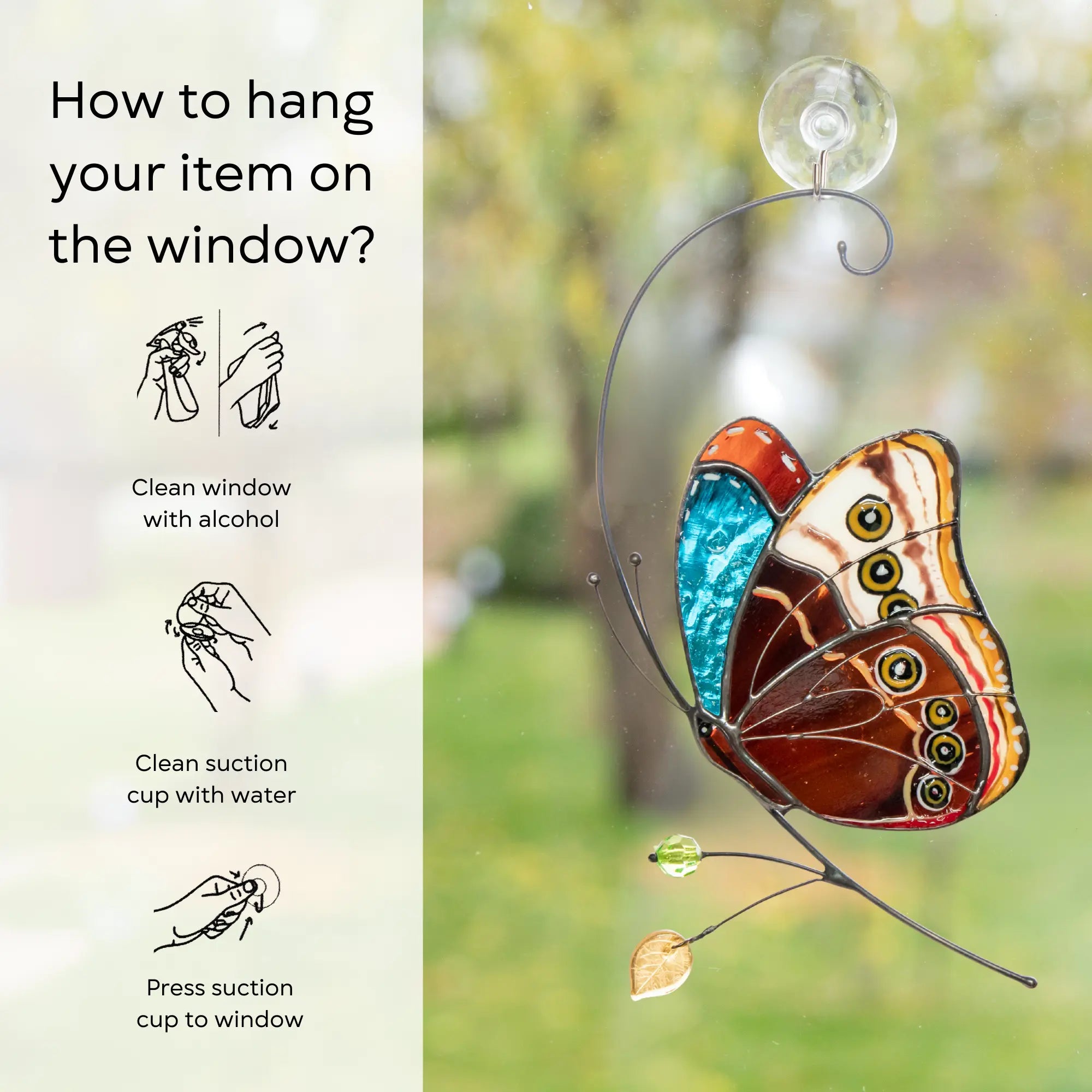 how to hang stained glass butterfly on window with suction cup: clean window and suction cup, press a cup to the surface