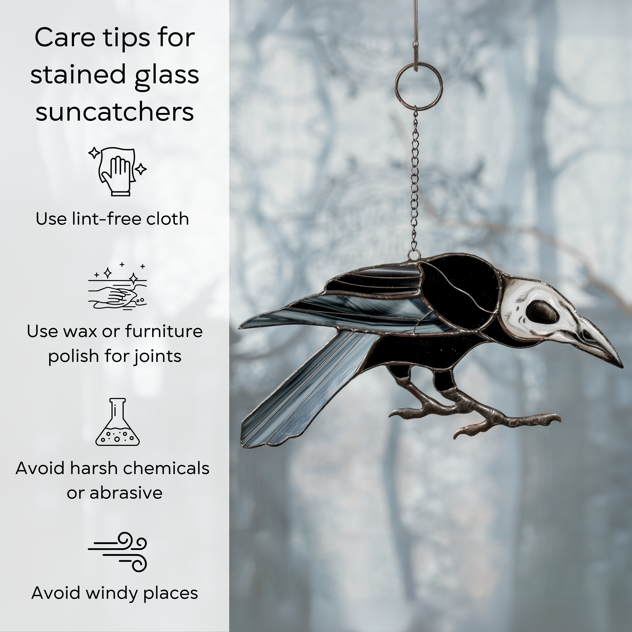 Dark stained glass raven with skeletal head hanging in front of a misty forest scene, care instructions listed to the side: use lint-free cloth, polish joints with car wax or furniture polish, avoid harsh chemicals, and windy places.