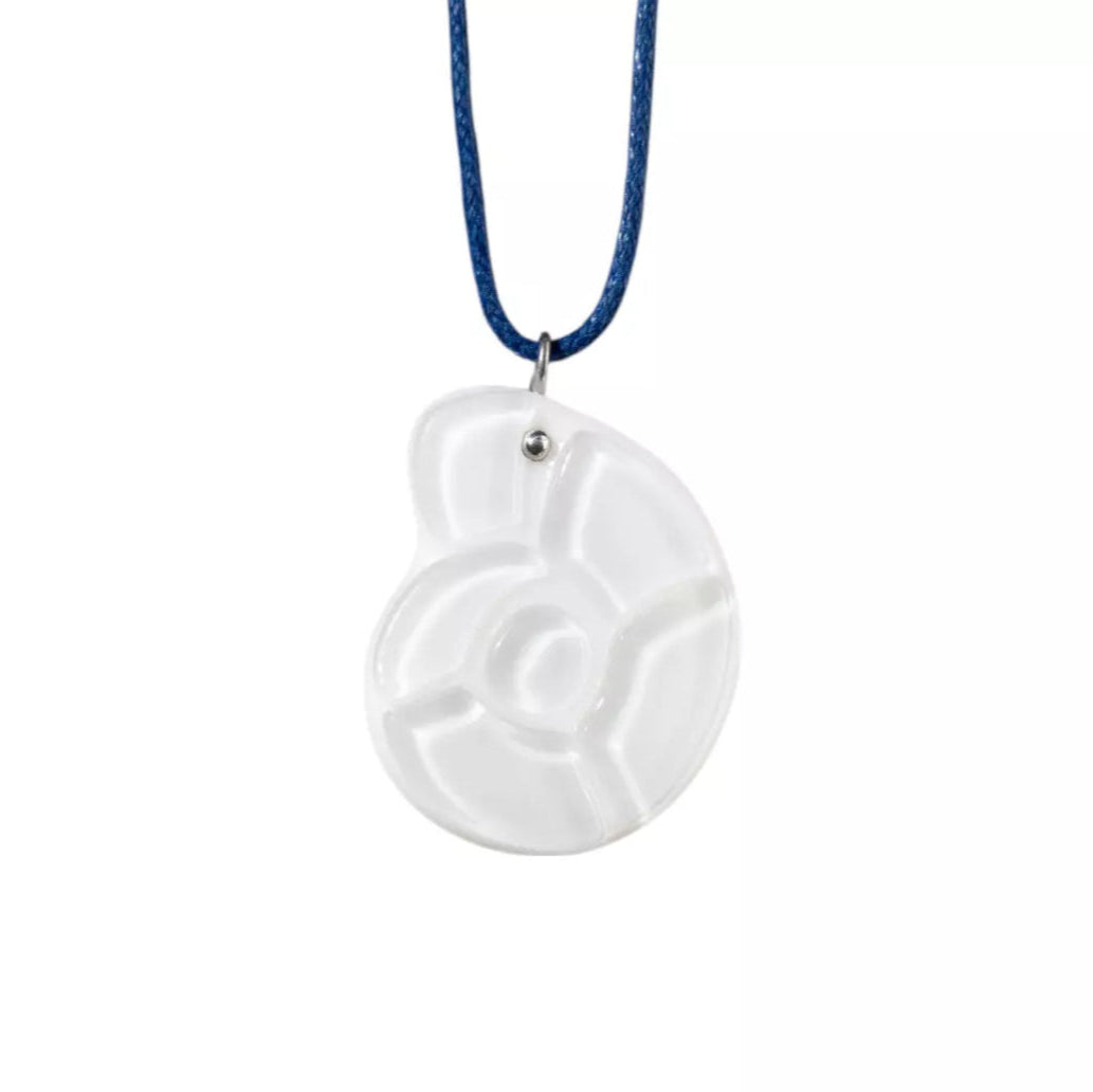 White Nautilus fused stained glass pendant on a blue cord against a white background