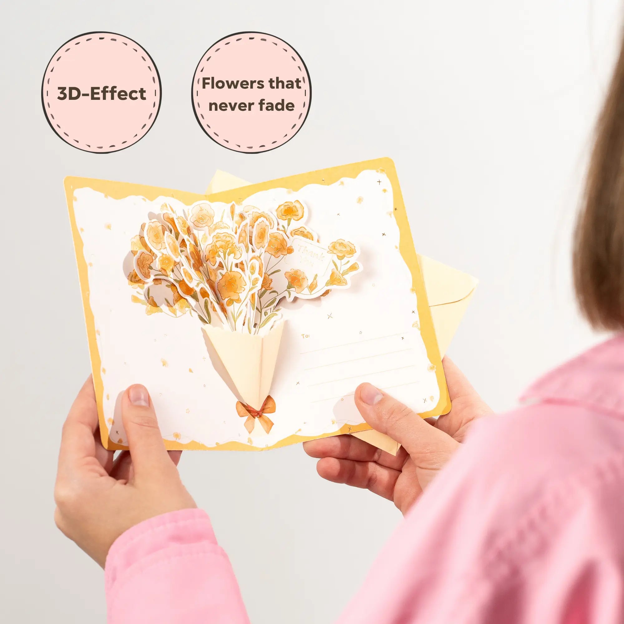 Women holding a 3D floral card with 3D-Effect as Flowers that never fade