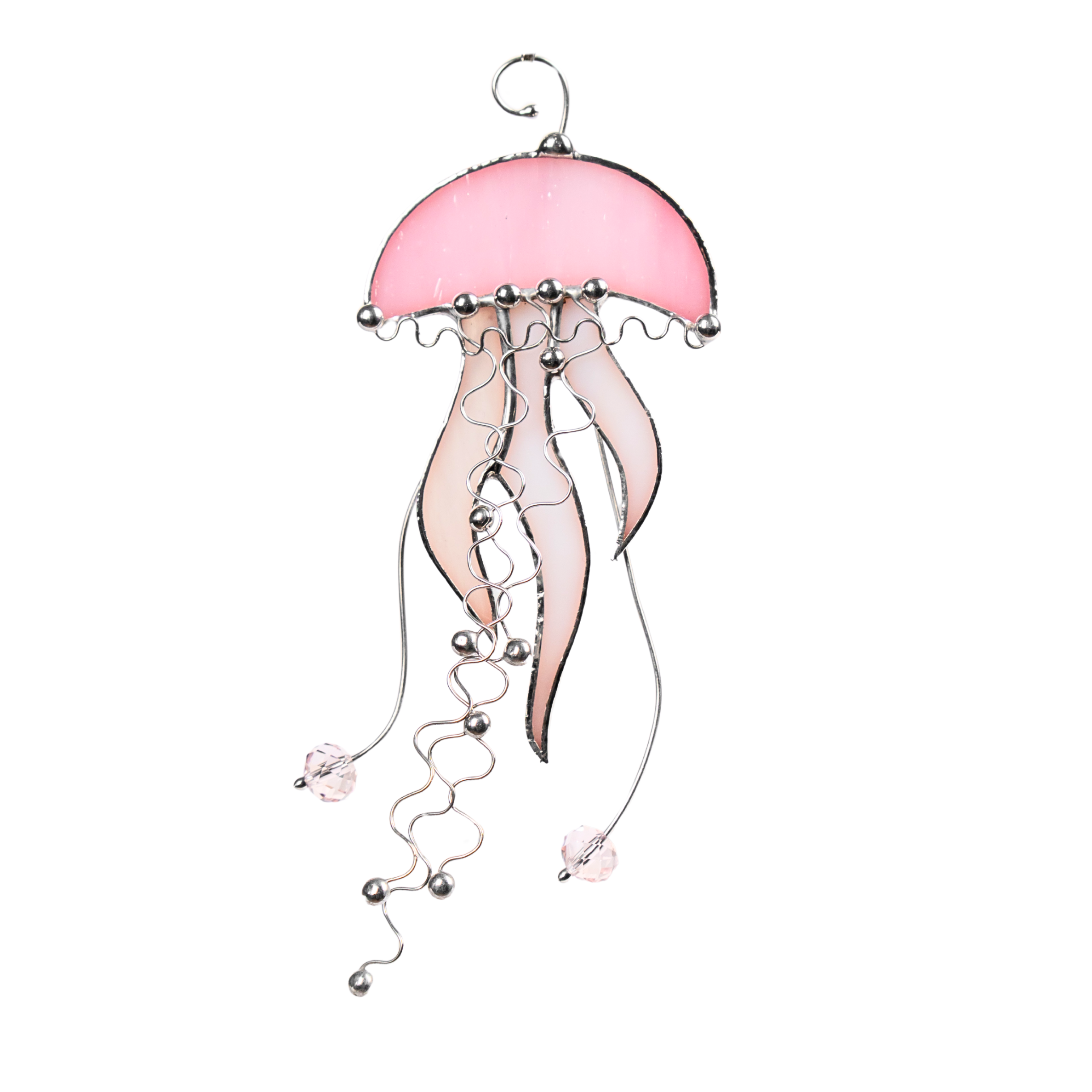 Pink jellyfish stained glass suncatcher with flowing curves and beaded ends.