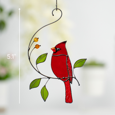 Red stained glass cardinal on branch with green leaves, with height marked as 5.1 inches.