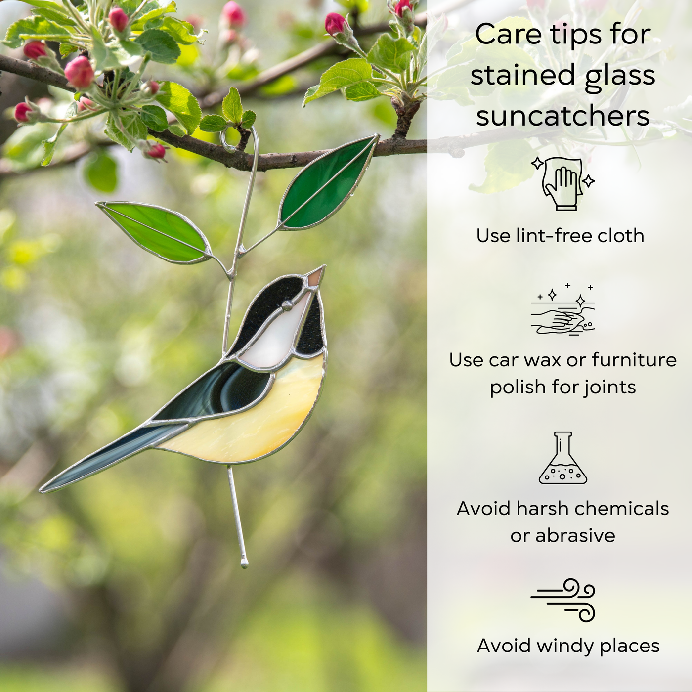Stained glass chickadee hanging from blooming tree, surrounded by green leaves and pink flower buds, with care tips for suncatchers
