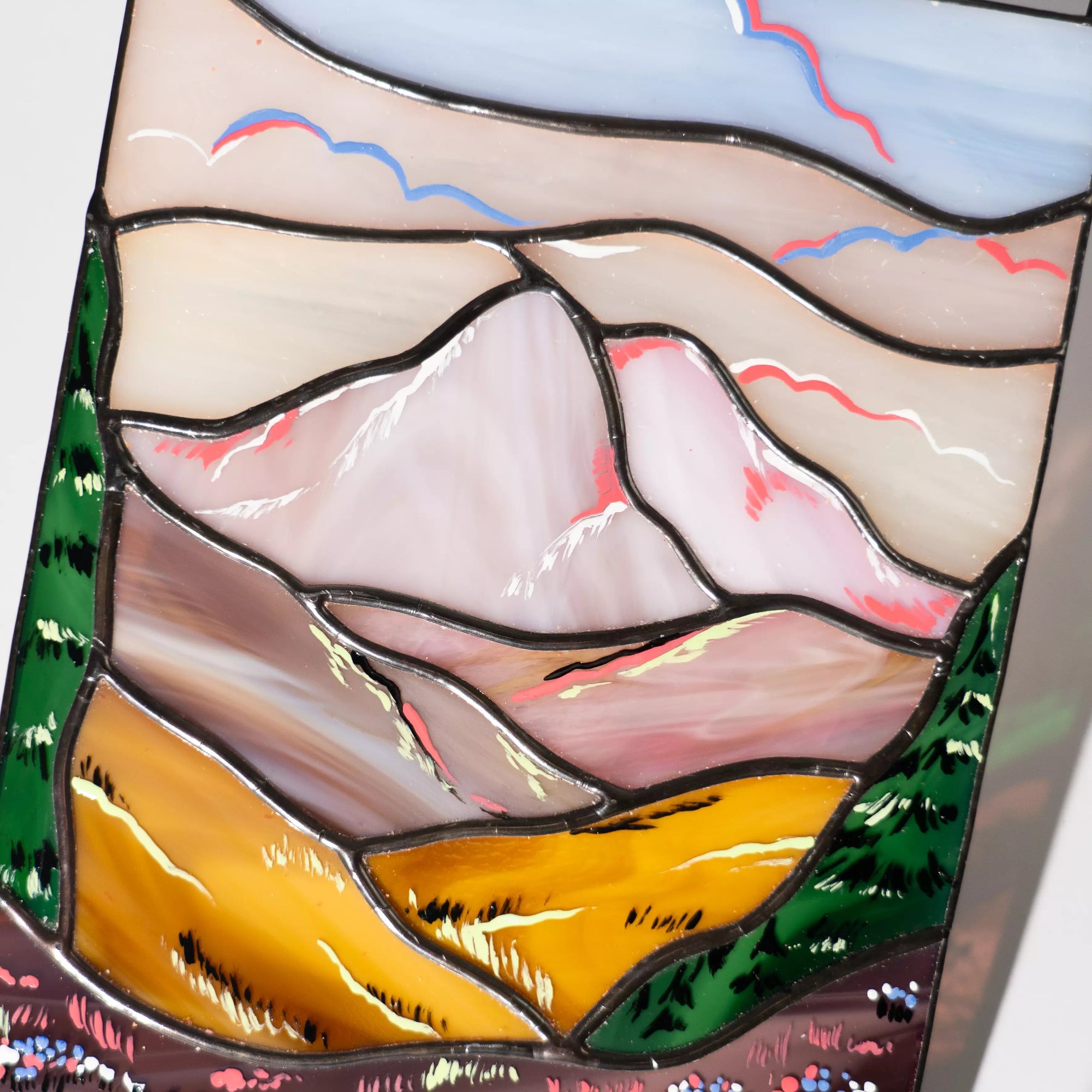 Stained glass panel with mountain and landscape design