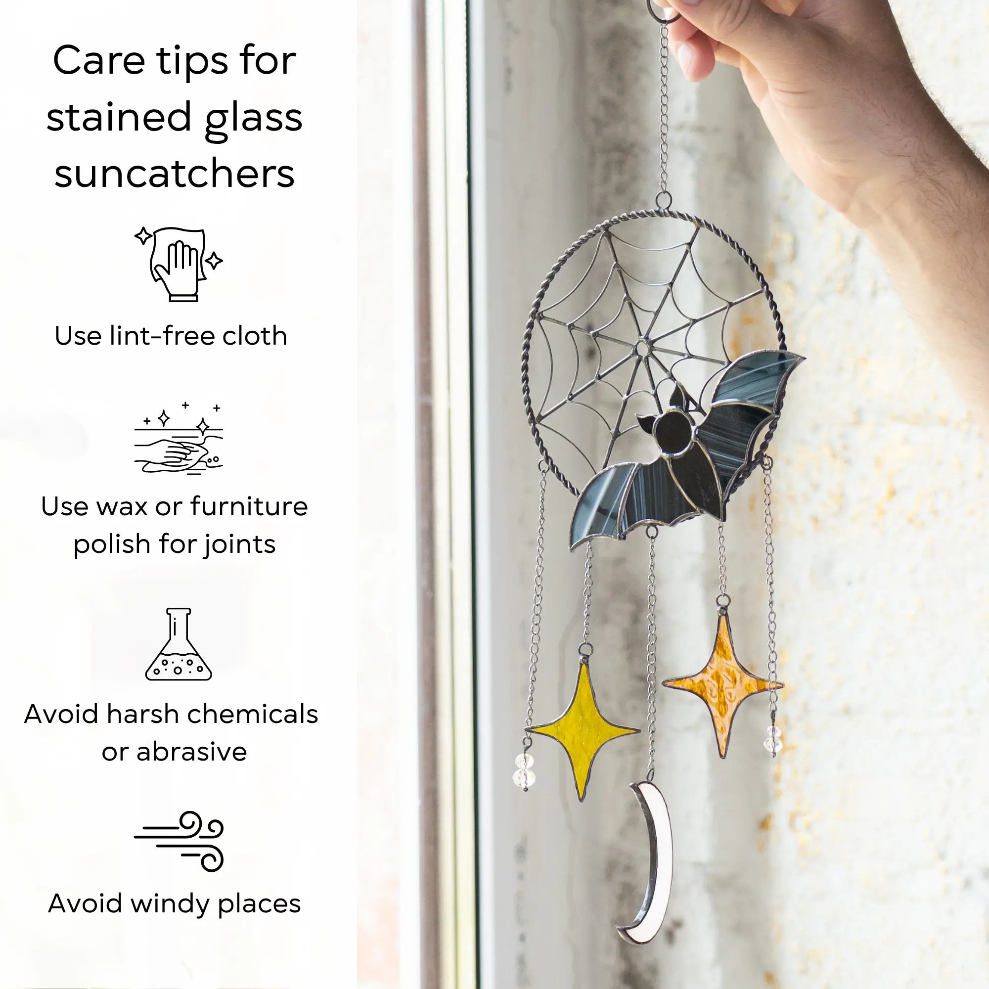 Stained glass Halloween suncatcher with care tips displayed on a window: use lint-free cloth, polish joints with car wax or furniture polish, avoid harsh chemicals, and windy places.