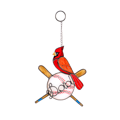 Red stained glass cardinal sitting on a baseball with two crossed bats and wire word “Dad”.