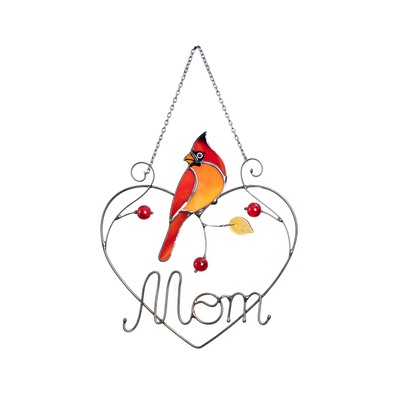 Orange-red stained glass cardinal in metal heart frame with “Mom” text and red beads.