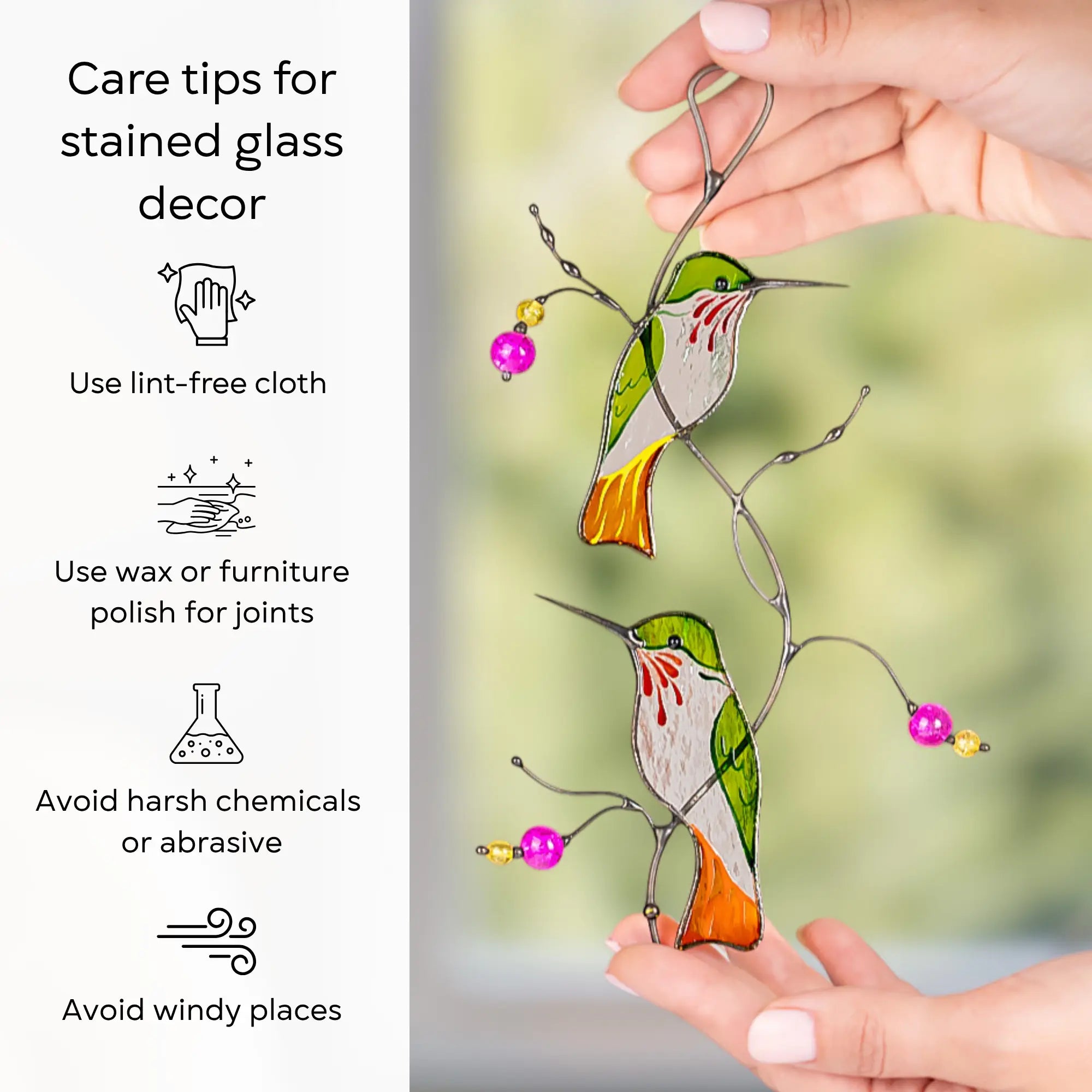 Stained glass suncatcher of hummingbirds held by a hand with care tips on the left: use lint-free cloth, polish joints with car wax or furniture polish, avoid harsh chemicals, and windy places.