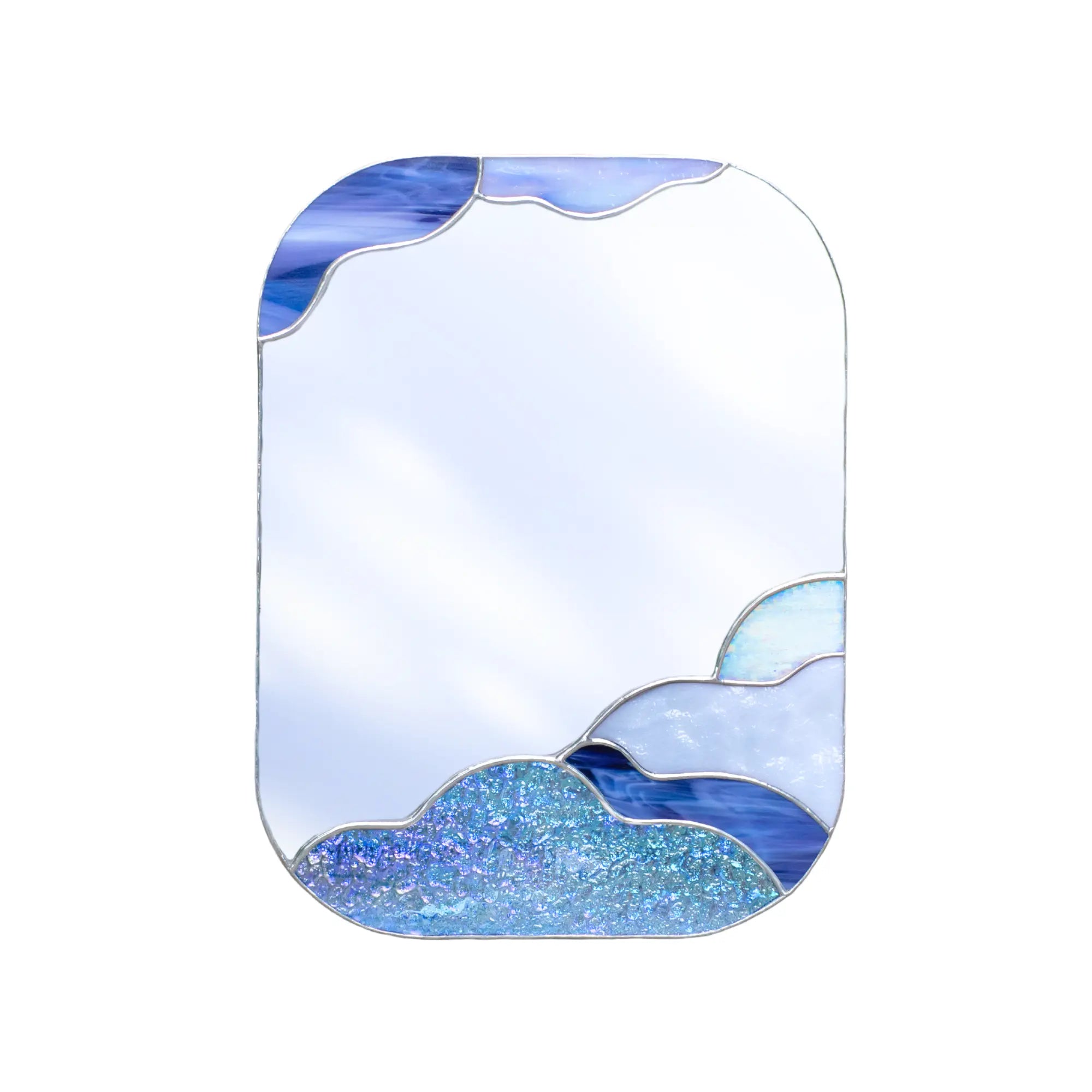 Stained glass mirror with blue and white wave design on a white background