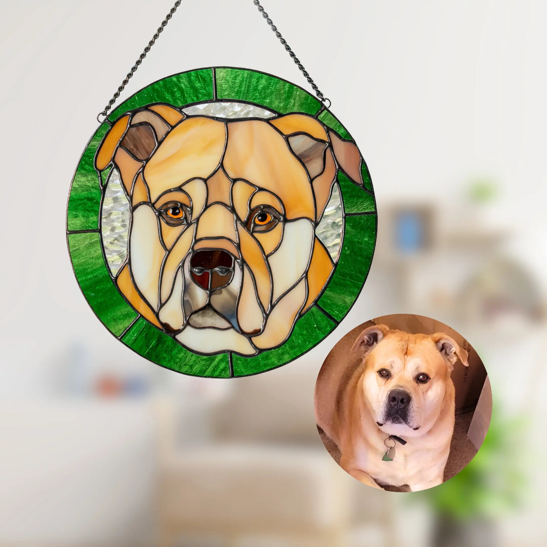 Stained glass pet portrait of a dog with a green frame, next to a photo of the real dog.