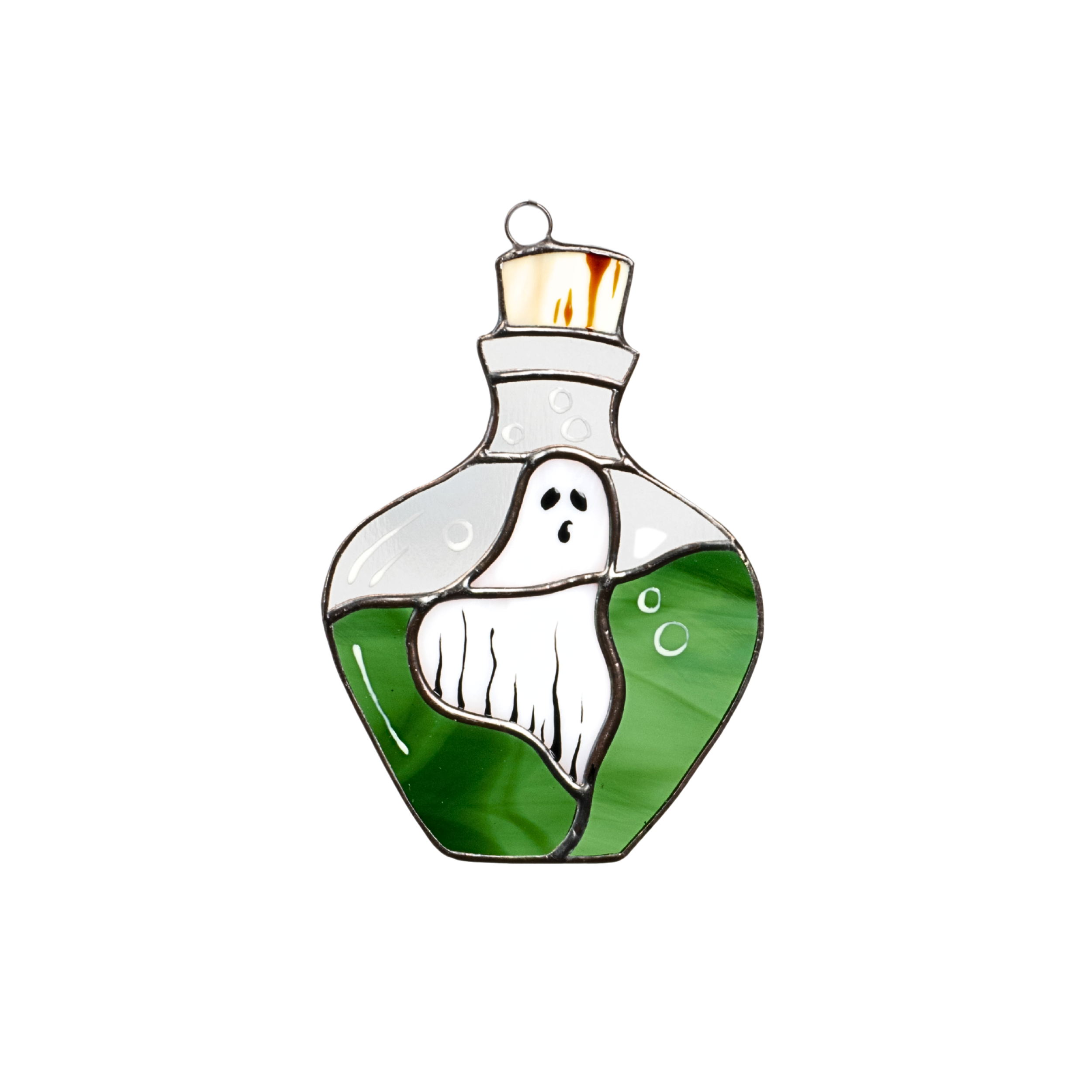 Stained glass suncatcher shaped like a potion bottle with a white ghost and green liquid inside, isolated on white background.
