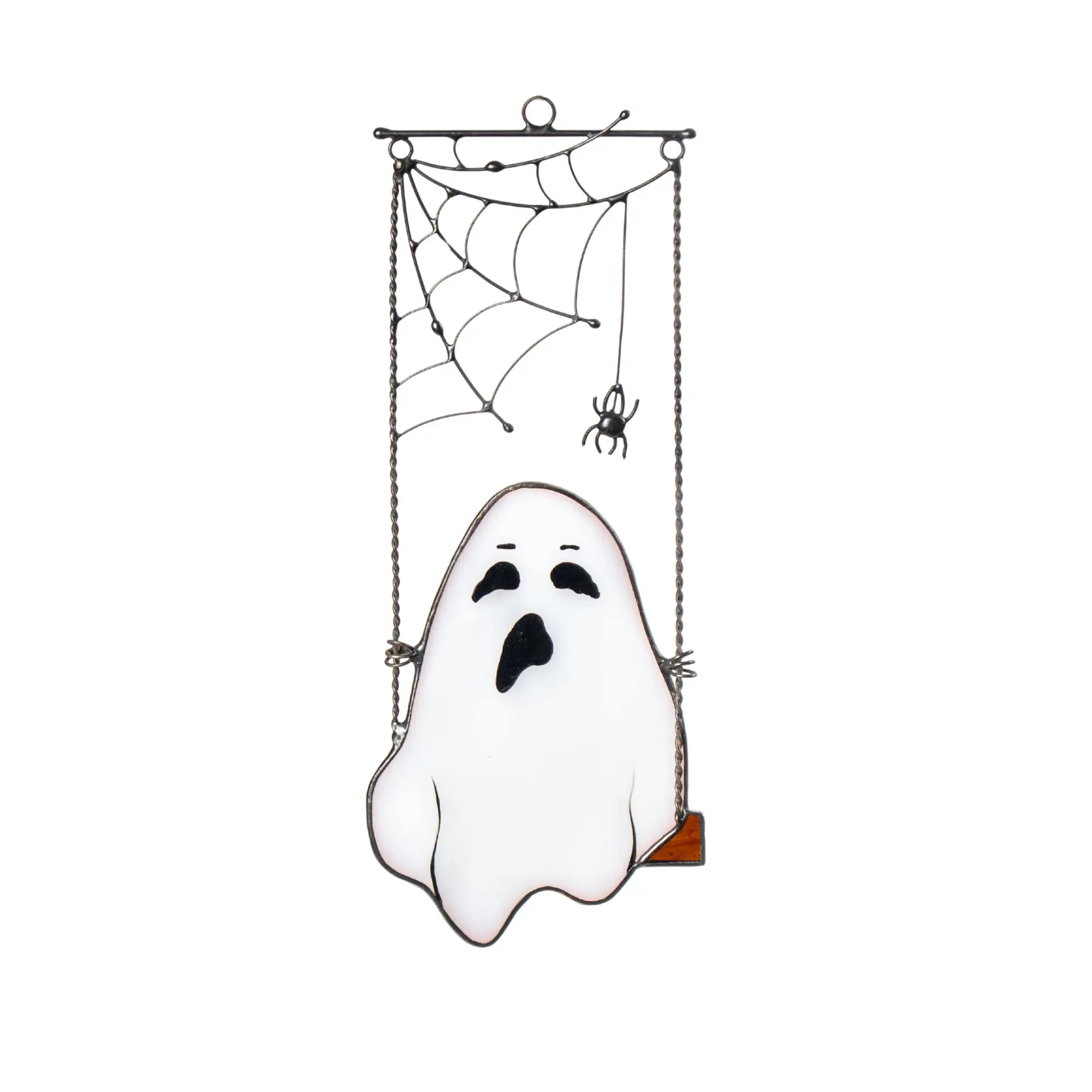 White stained glass ghost swinging under spiderweb with hanging spider
