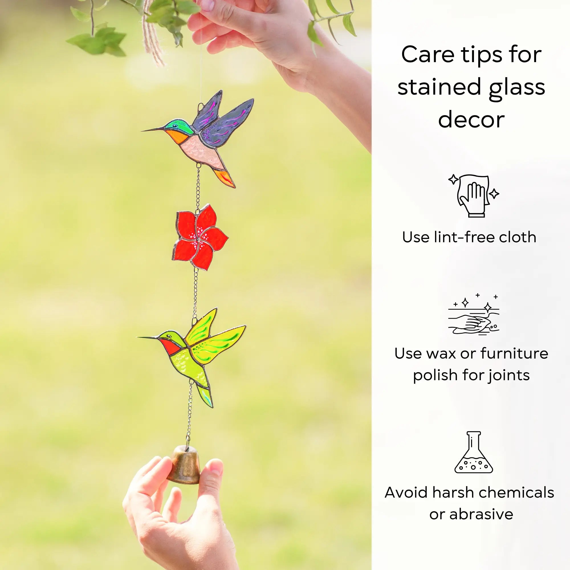 Stained glass wind chime hummingbird and flower decoration held by hands with care tips on a green background: use lint-free cloth, polish joints with car wax or furniture polish, avoid harsh chemicals, and windy places.
