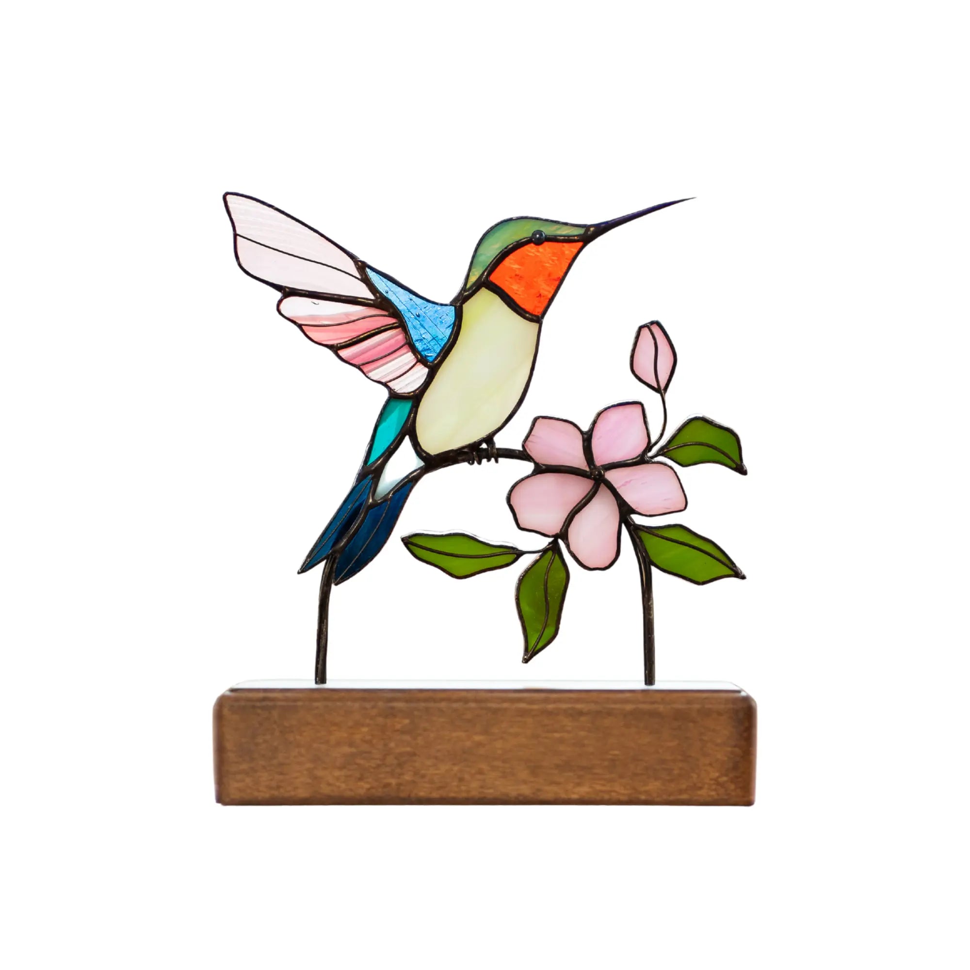 Stained glass hummingbird and flower suncatcher on a wooden base