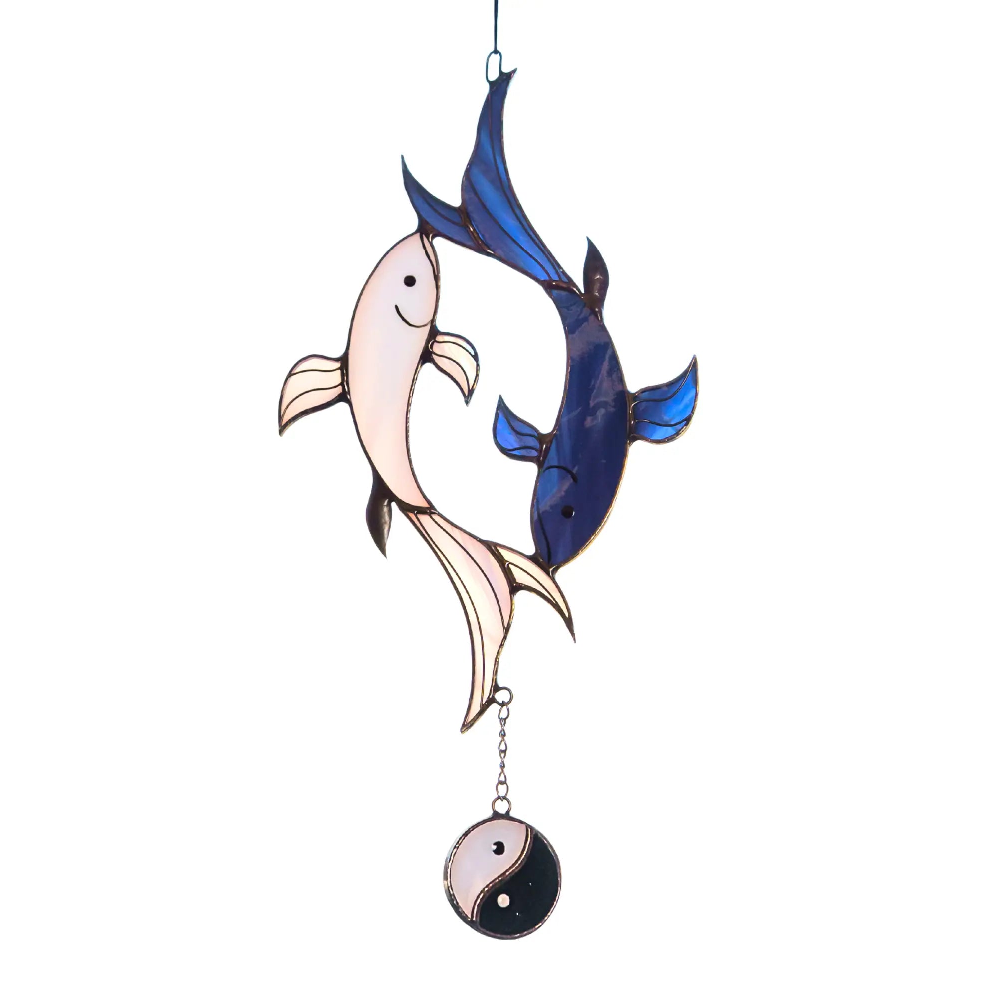 Stained glass suncatcher featuring two koi fish in blue and white with a yin-yang charm.