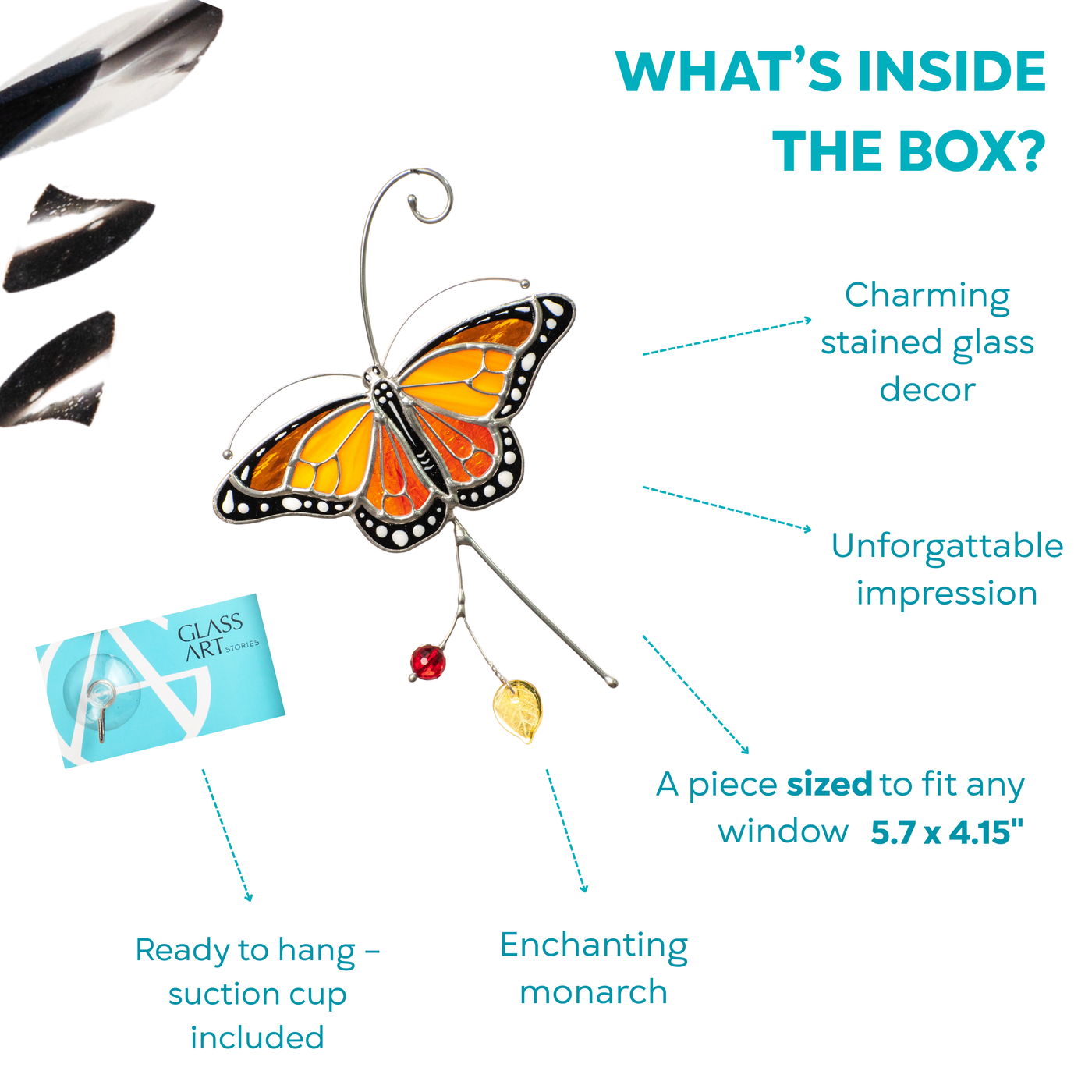 Open gift box displaying stained glass monarch butterfly and included suction cup.