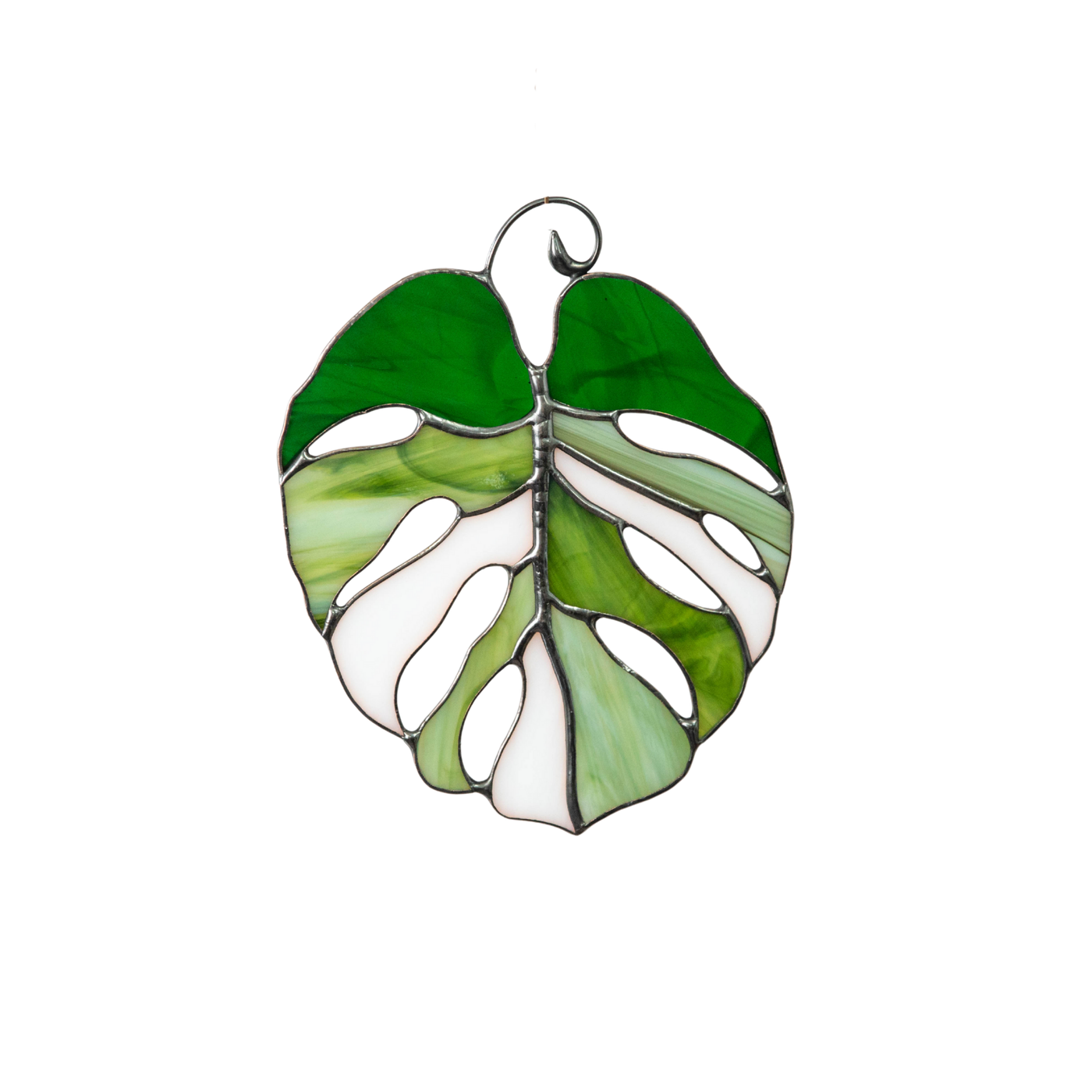 Stained glass monstera leaf suncatcher in mixed green and white glass