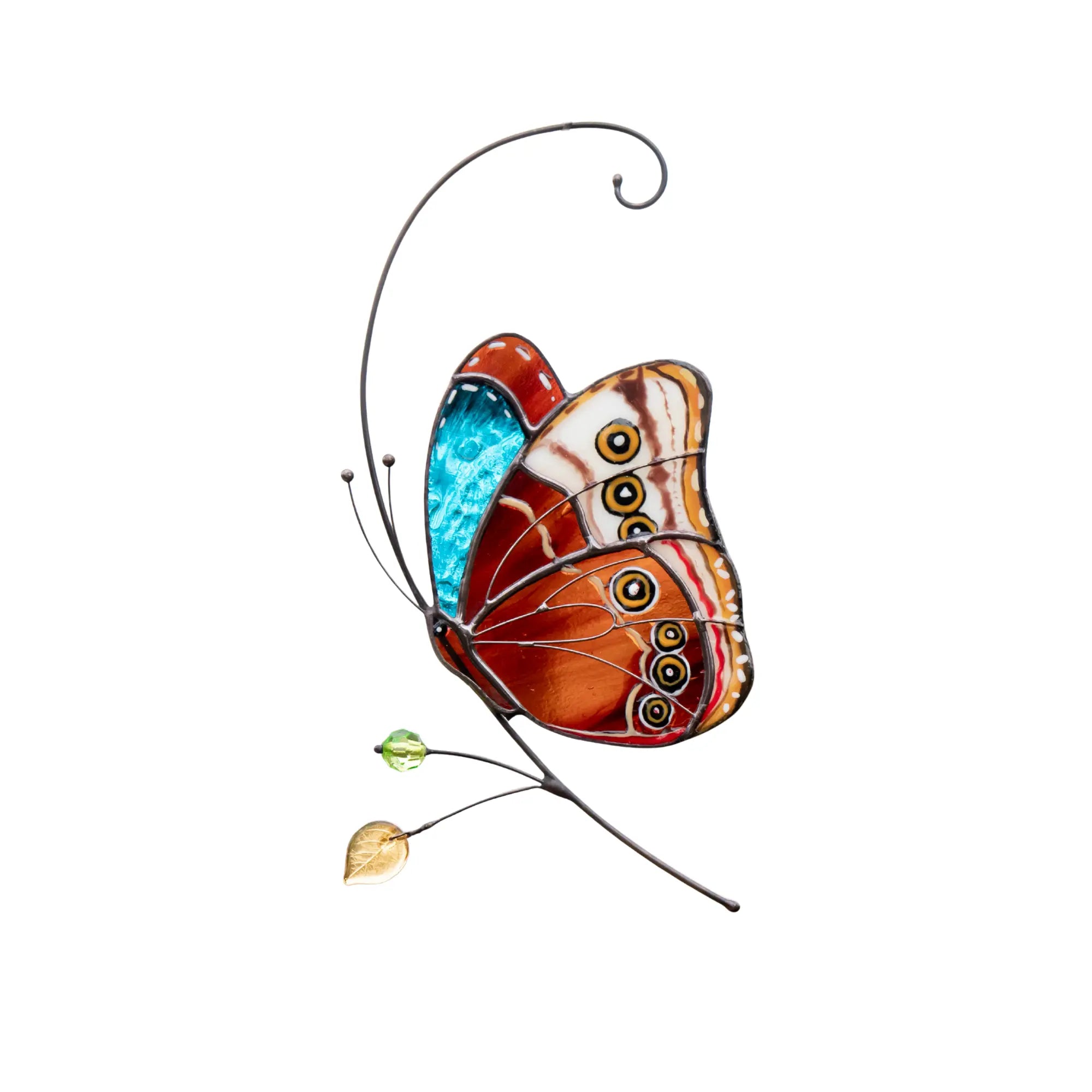 Bright stained glass butterfly with orange, blue and brown wings