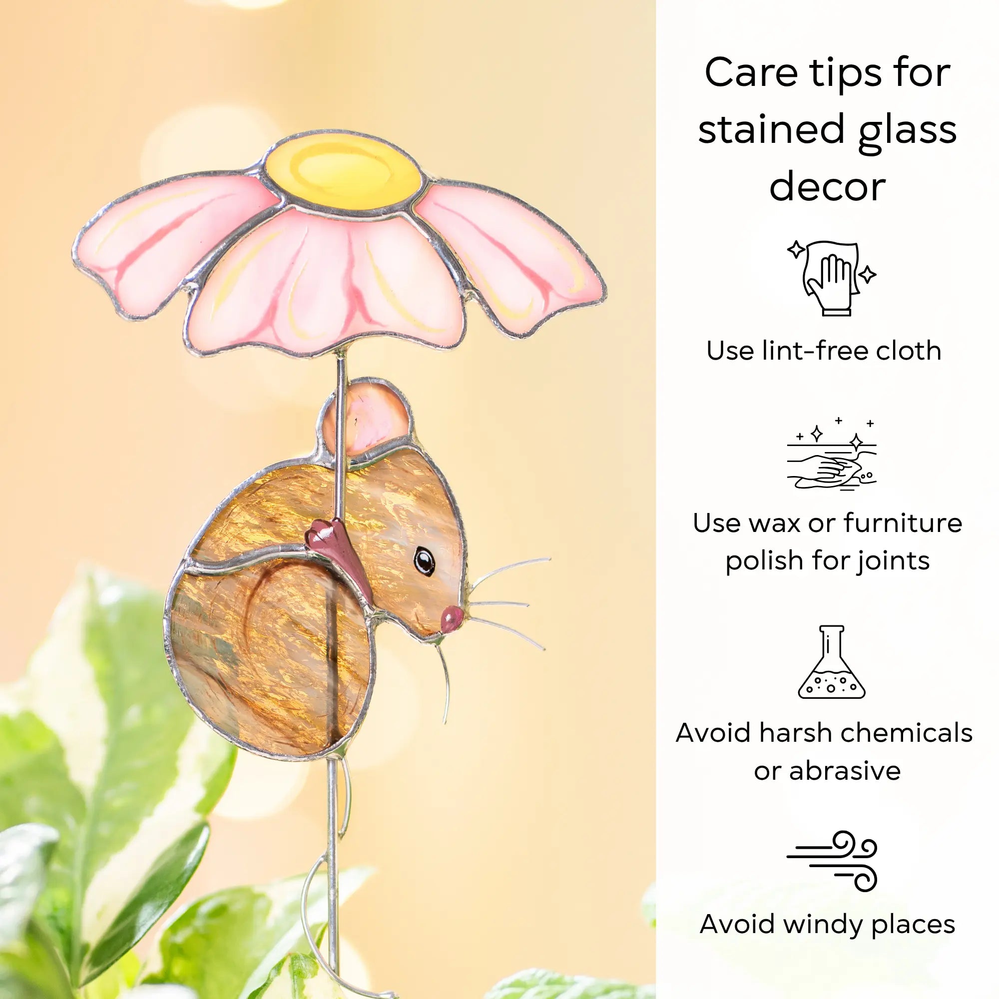 Stained glass mouse with flower decoration on a yellow background with care tips: use lint-free cloth, polish joints with car wax or furniture polish, avoid harsh chemicals, and windy places.
