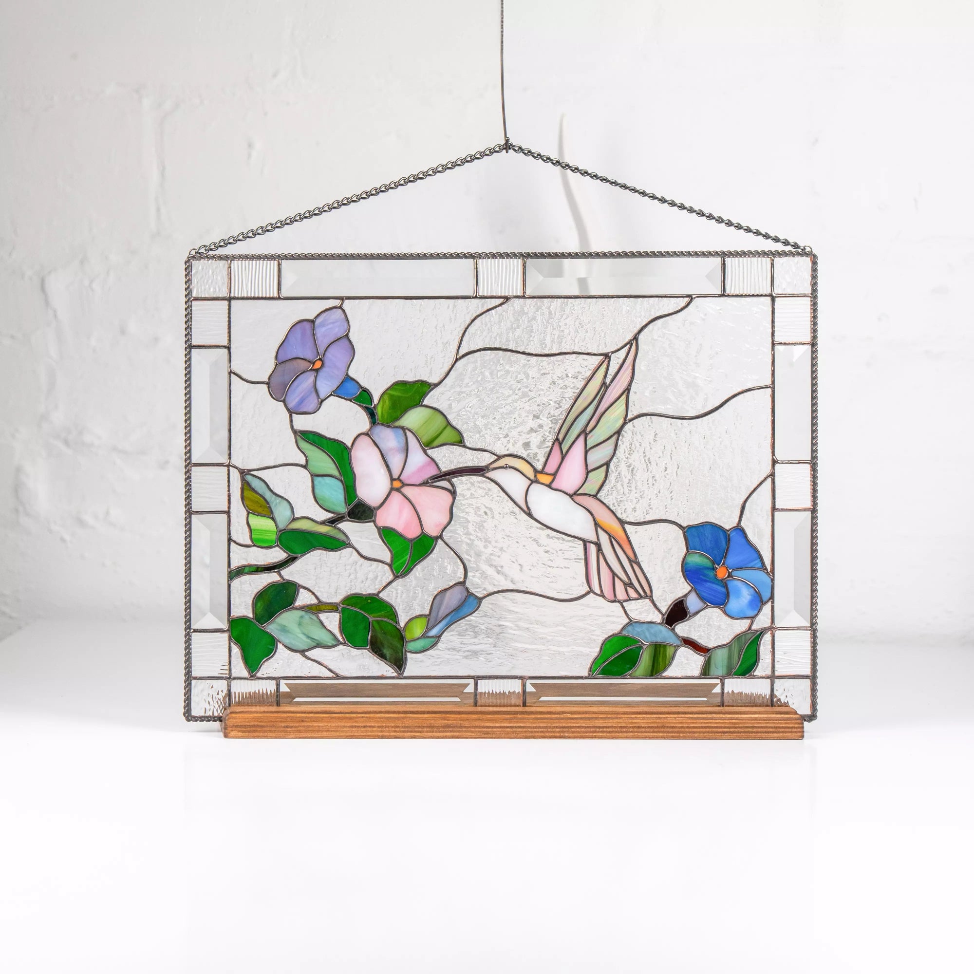 Stained glass panel with a pink hummingbird and flowers home decor