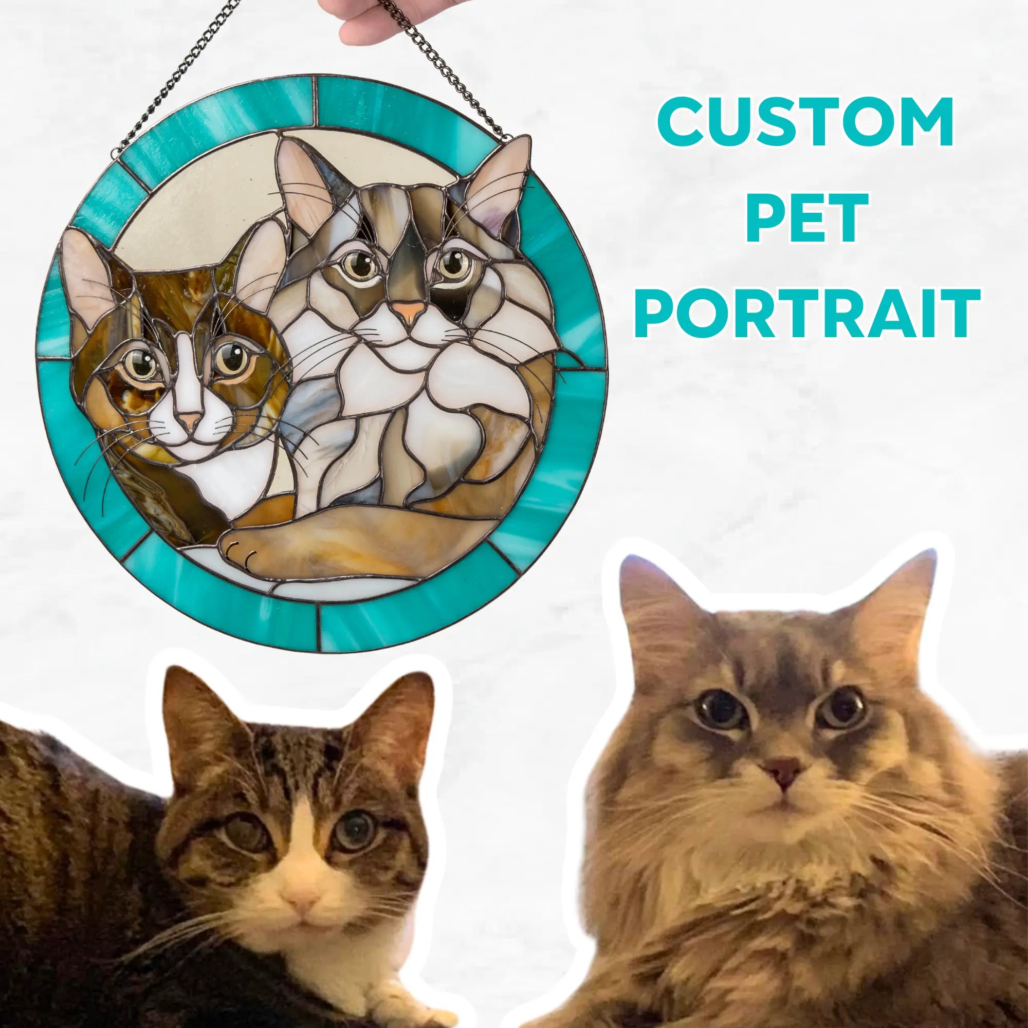 Stained glass panel custom pet portrait of two cats with a hand holding it, and two real cats below.