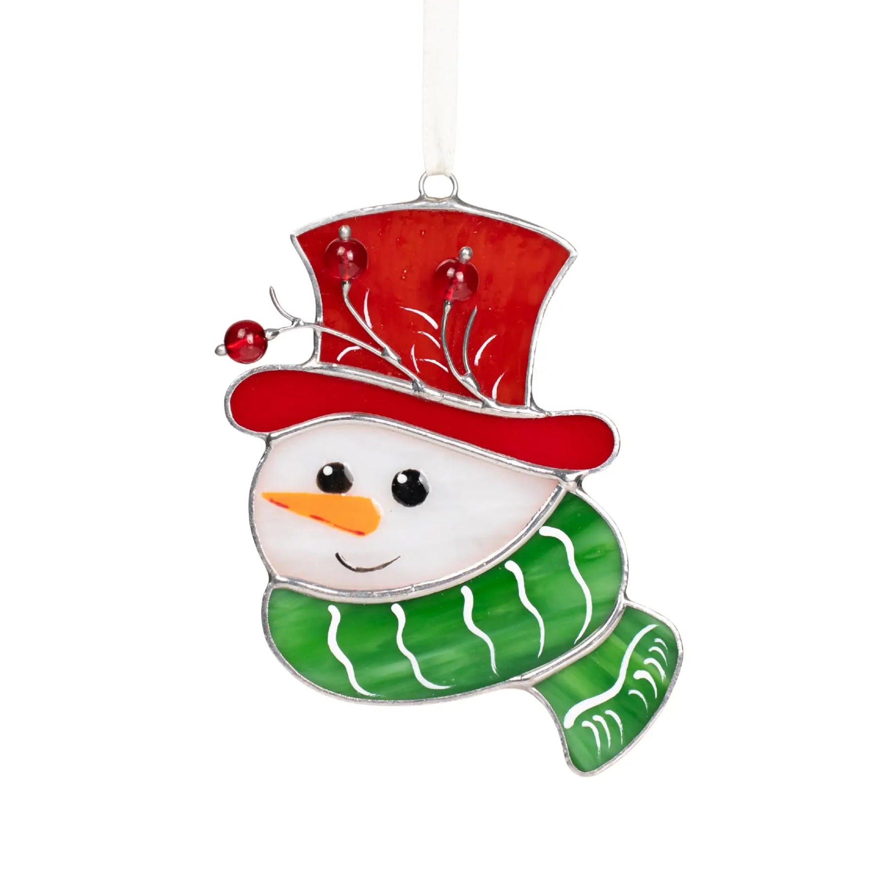 Smiling stained glass snowman wearing a red hat with red beads and a green scarf, hanging on a ribbon.