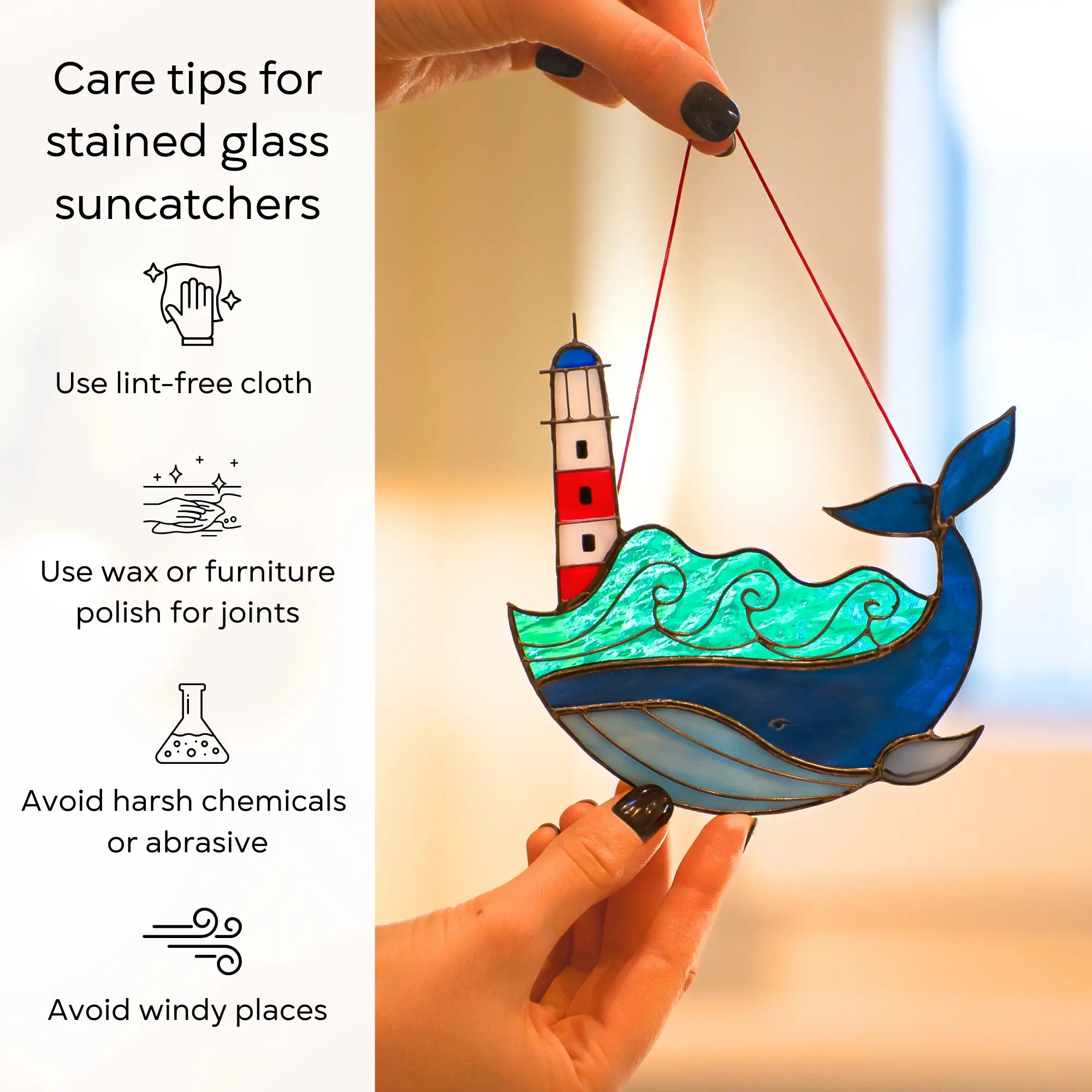 Stained glass suncatcher whale with a lighthouse, held by hands, next to care tips: use lint-free cloth, polish joints with car wax or furniture polish, avoid harsh chemicals, and windy places.