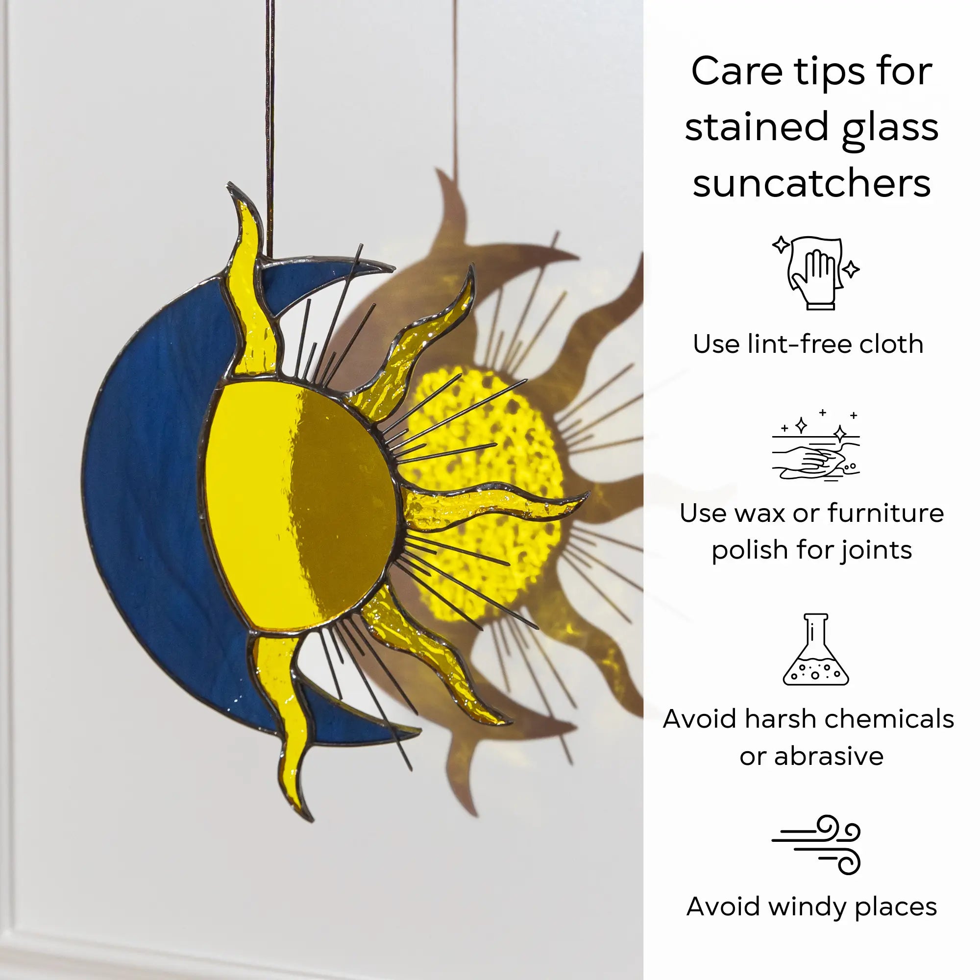 Stained glass sun and moon suncatcher with care tips on a white background: use lint-free cloth, polish joints with car wax or furniture polish, avoid harsh chemicals, and windy places.