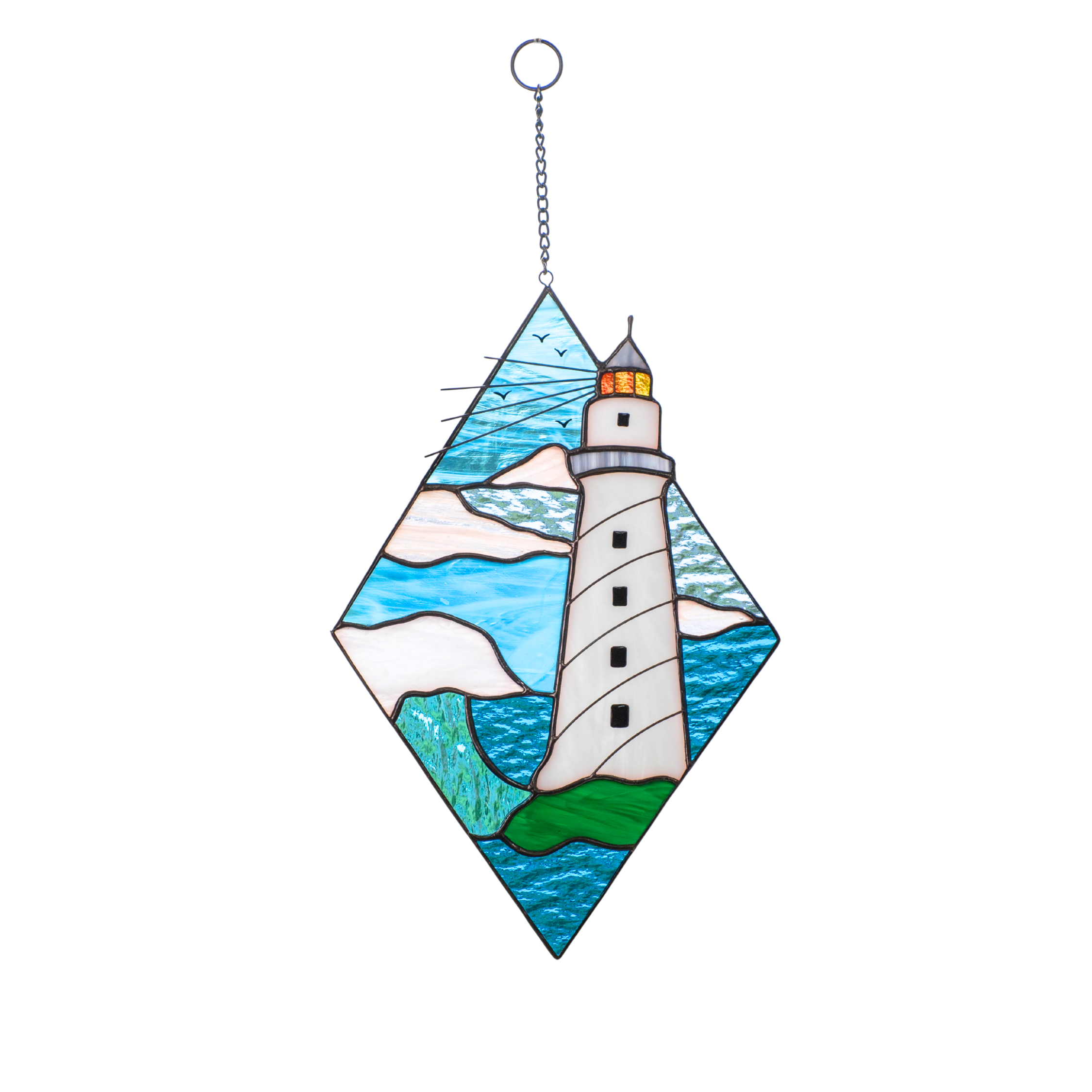 Stained glass panel featuring a lighthouse standing in front of strong blue waves