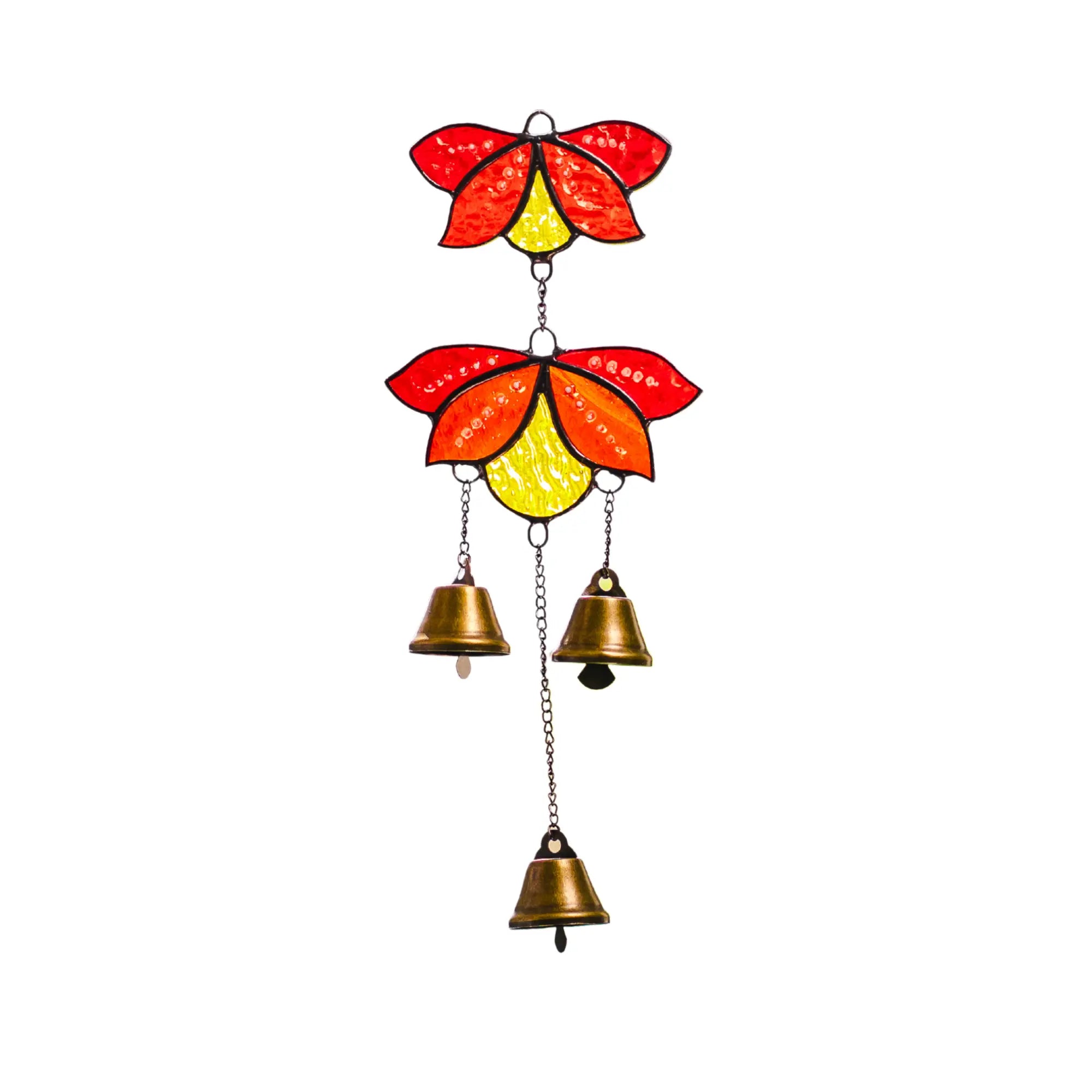 Stained glass wind chime featuring red and yellow flower shapes and three small hanging brass bells, isolated on white.