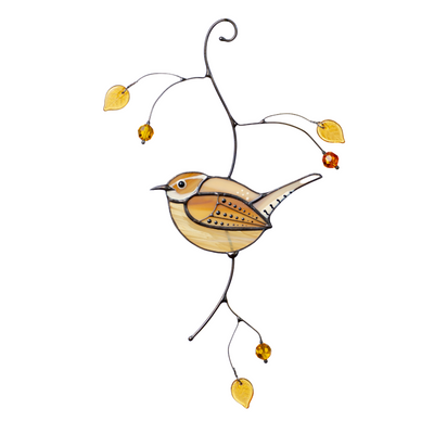Amber-colored stained glass wren suncatcher hanging, delicate beads and leaves on wire branches
