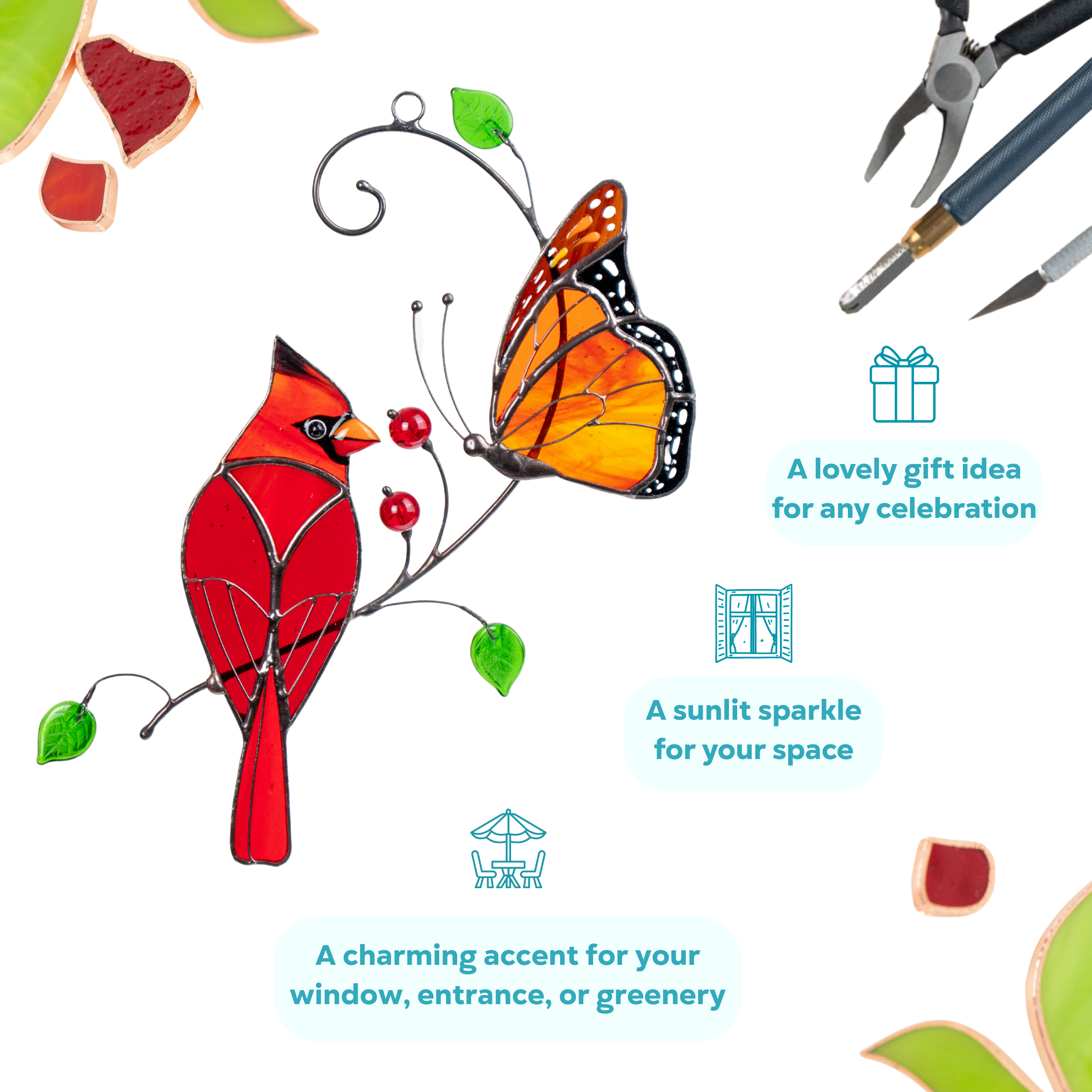 Red stained glass cardinal with an orange monarch butterfly perched on a metal branch with green leaves.