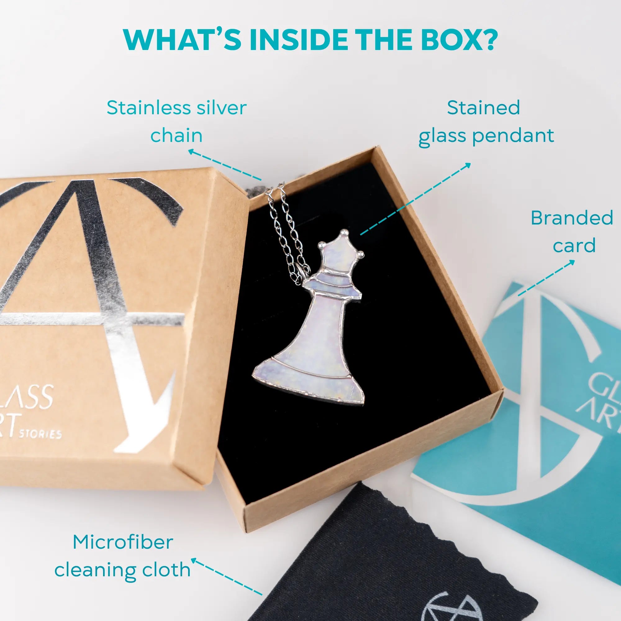 Unboxing of stained glass queen pendant with stainless chain, branded card, and cloth in elegant gift packaging.