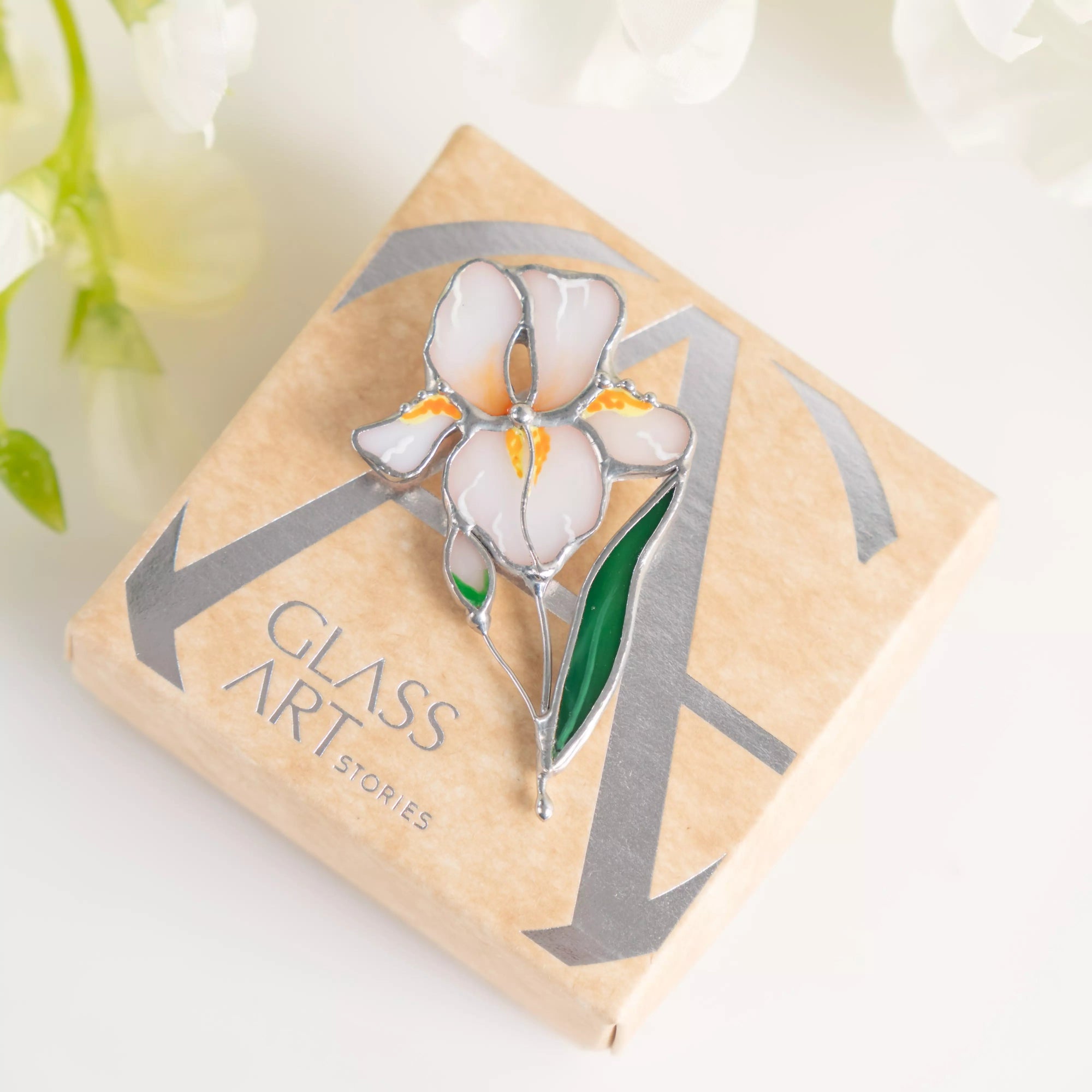 Stained glass iris brooch in white and green tones, handmade flower jewelry, perfect gift.

