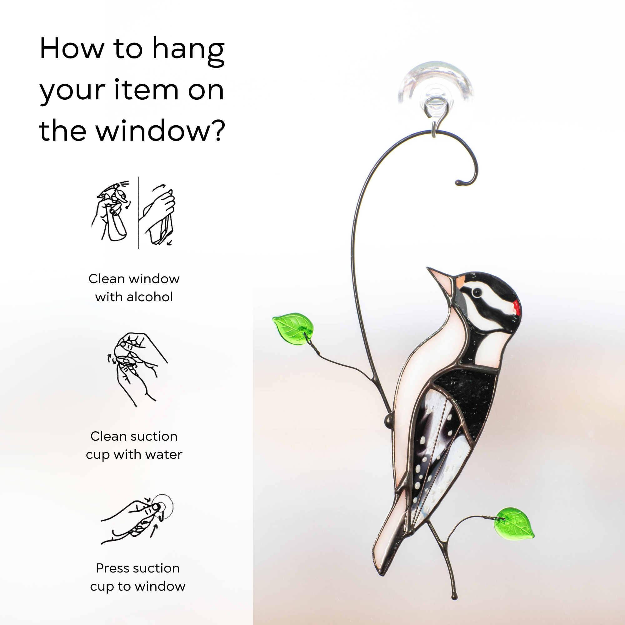 Hanging guide for stained glass woodpecker suncatcher, with suction cup attached and illustrated cleaning instructions