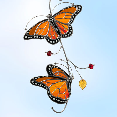 Stained glass bright orange monarch butterflies suncatcher 