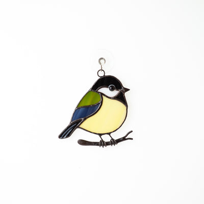 Stained glass black chickadee on the branch window hanging