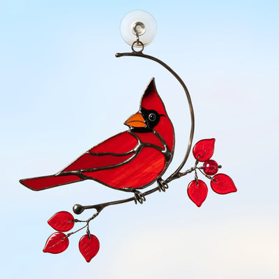 Stained glass male cardinal sitting on the branch with red leaves window hanging