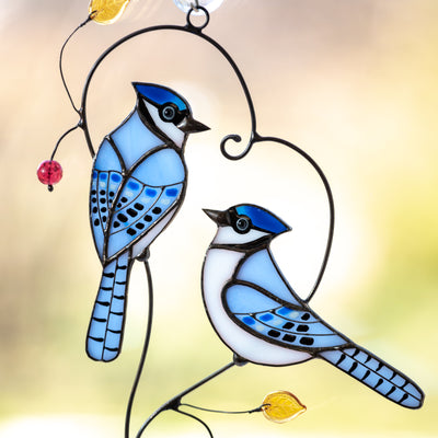 Zoomed stained glass suncatcher pf pair of bluejays 