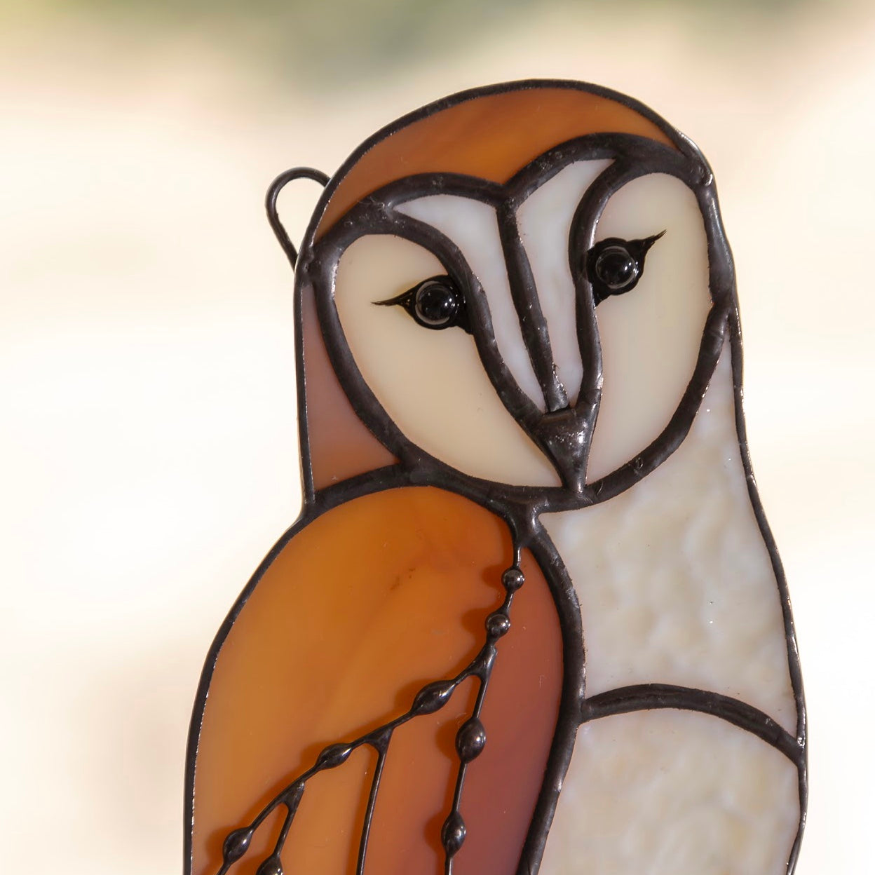 Zoomed stained glass barred owl suncatcher