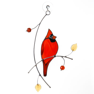 Stained glass window hanging of a Cardinal on the branch