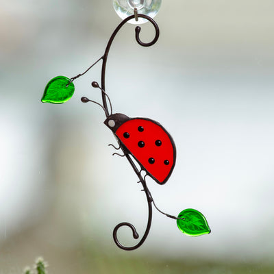 Stained glass ladybug side-view window hanging