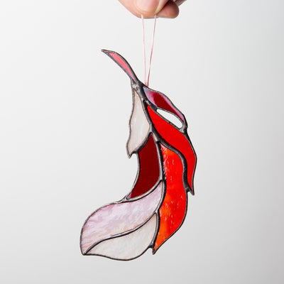 Red stained glass bending left feather suncatcher for window decoration