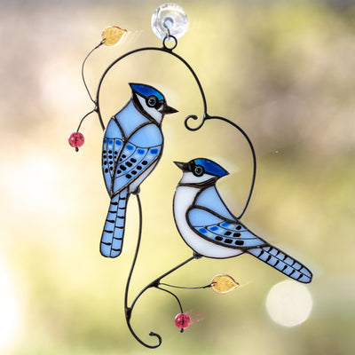 Stained glass pair of bluejays sitting on the branch suncatcher